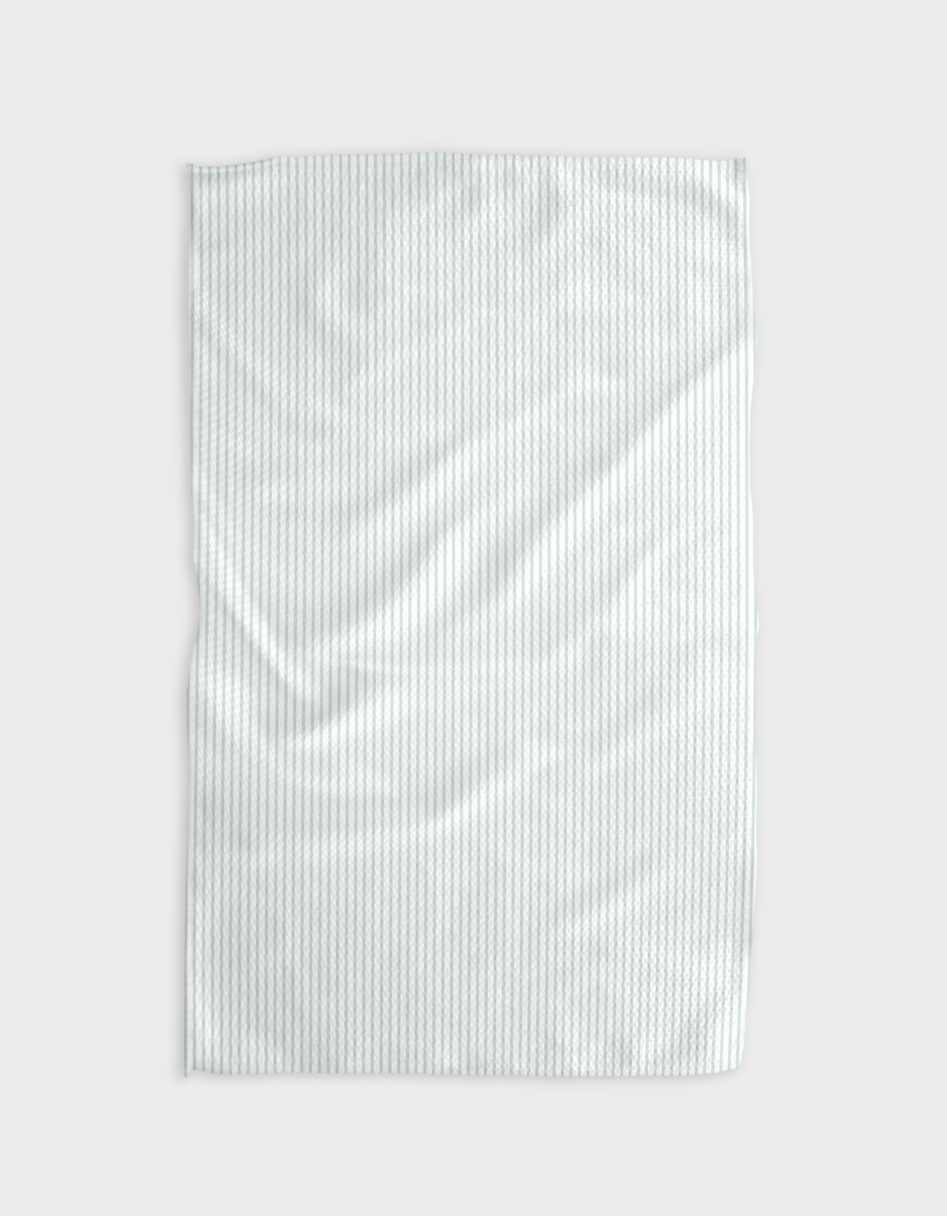 The Buy Guides Get In Line - Mint towel, shown on a light gray background, features subtle vertical mint stripes on white. Made from ultra-absorbent Geoweave fabric, it has a soft texture with gentle wrinkles.