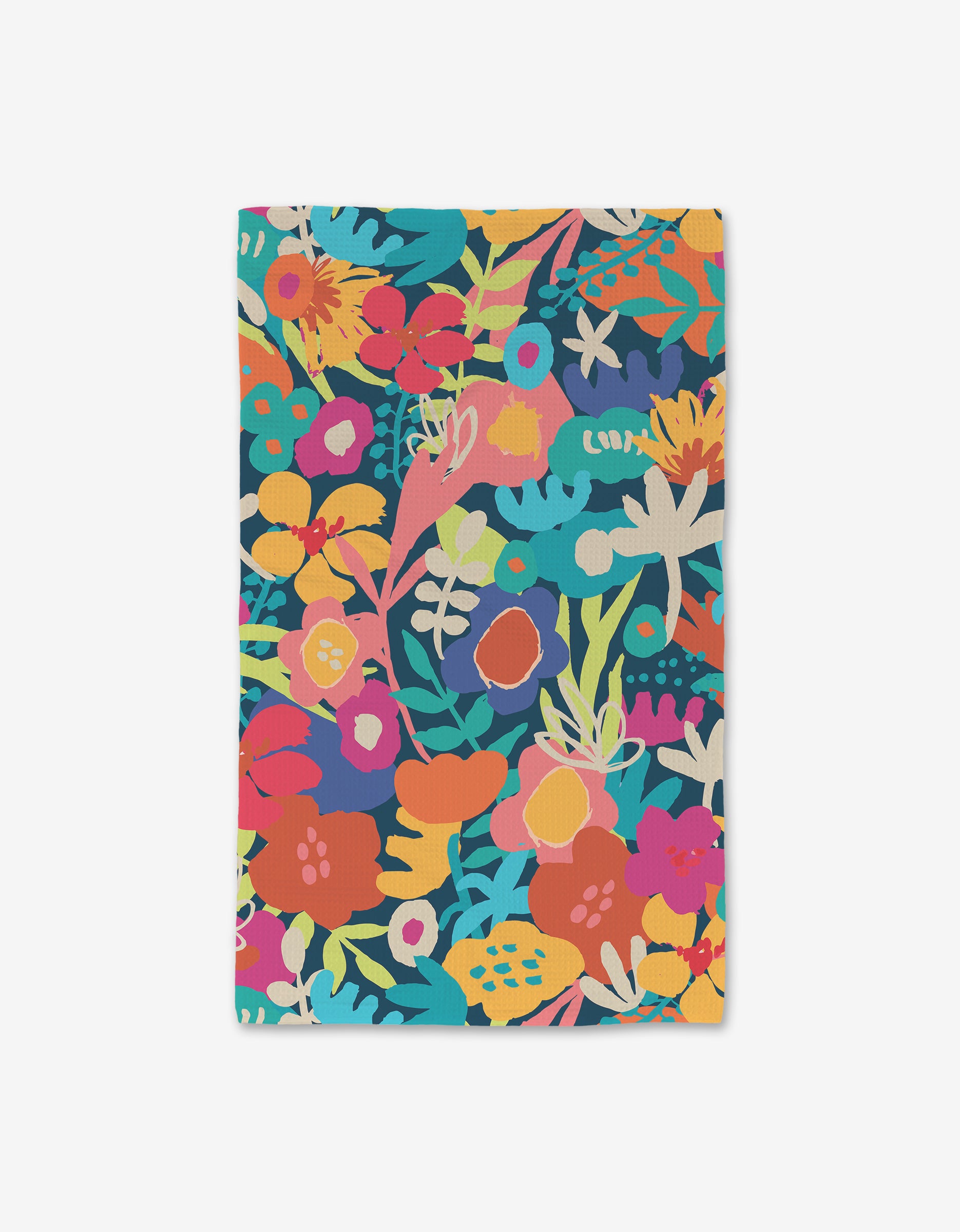 The Sareka Unique Bright Bunch Luxe Hand Towel features a colorful floral and leaf print in pink, orange, red, turquoise, yellow, and green on dark blue—crafted with ultra-absorbent Geoweave technology.