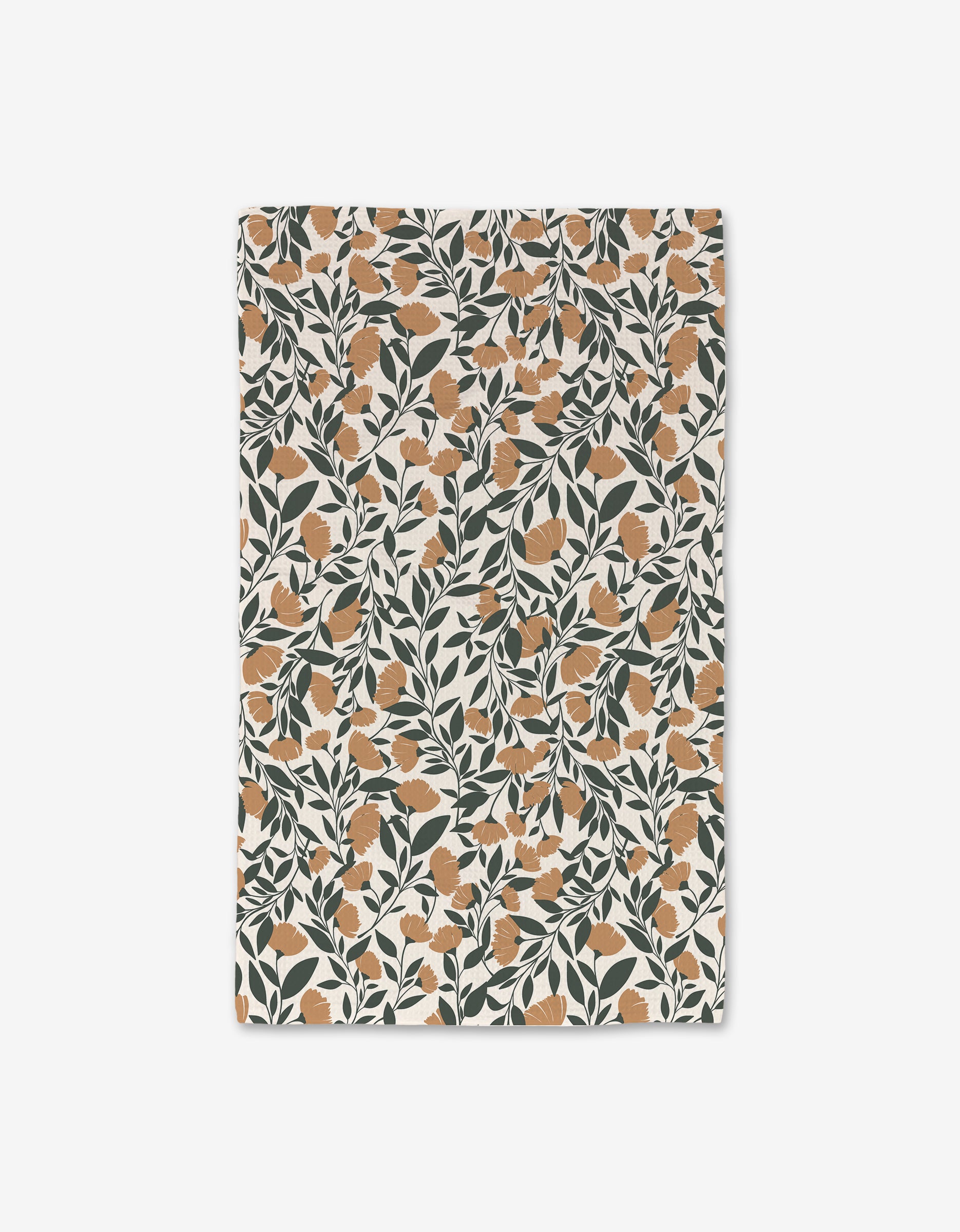 The Naomi hand towel by Charlie Rowan Designs is rectangular with a dense, symmetrical all-over orange floral and dark green leaf pattern on off-white. Ultra-absorbent and quick-drying for everyday luxury.