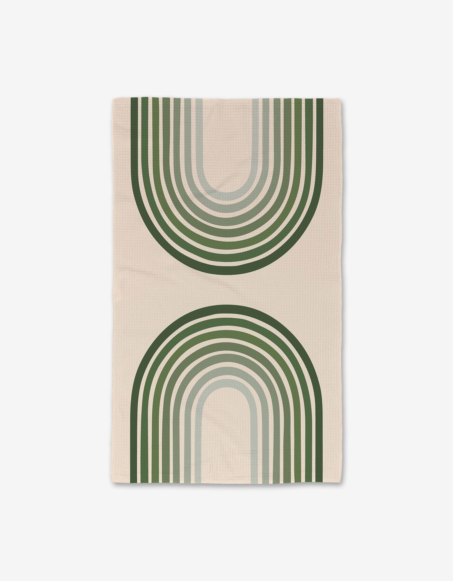 The Olive Arches blanket by GEOMETRY features large overlapping green and gray arches with striped accents on a beige background, creating a modern geometric design. Made from recycled materials.