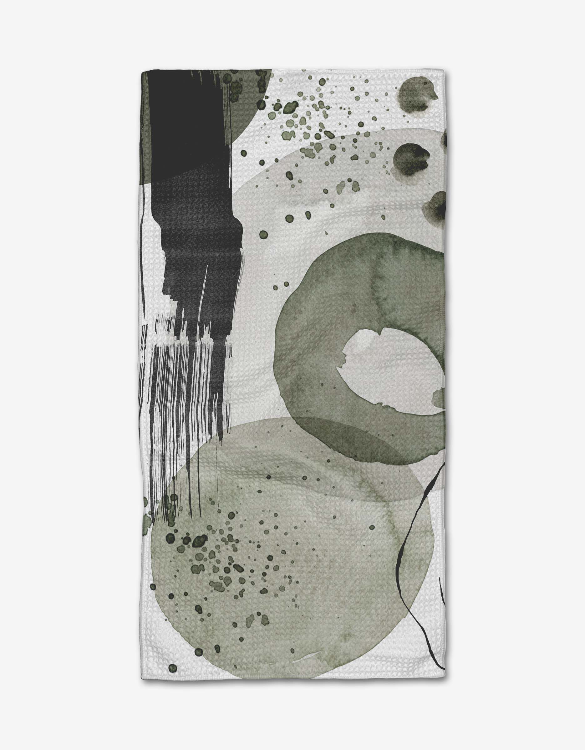 The Hunter Abstract bar towel by Kailee Wright features olive-green circles, black strokes, and spots on white Geoweave fabric, offering subtle texture and a modern watercolor design.