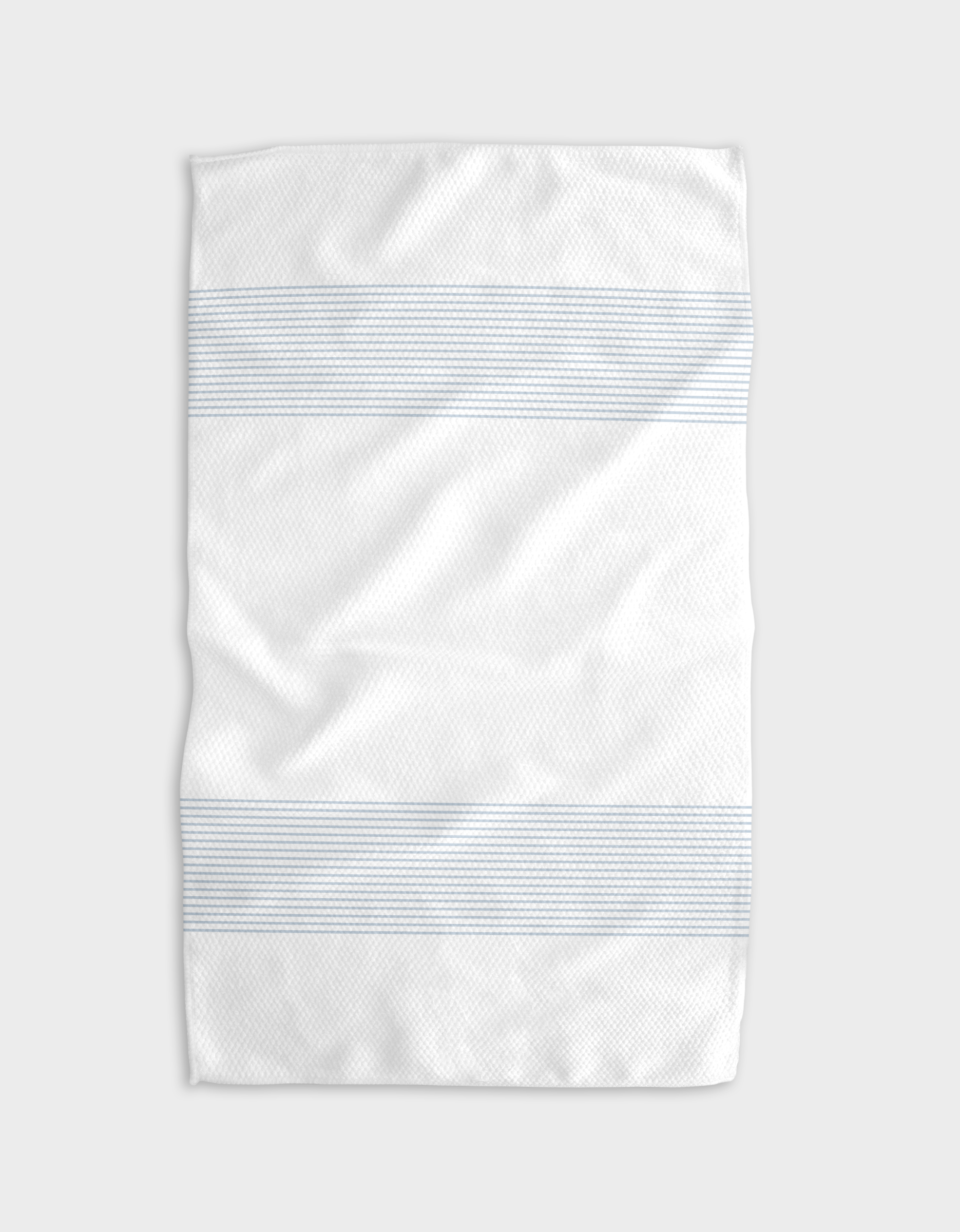 The Buy Guide’s Blank Space - Light Blue: a white tea towel with two light blue horizontal stripes, made from recycled materials and shown flat on a light gray background.