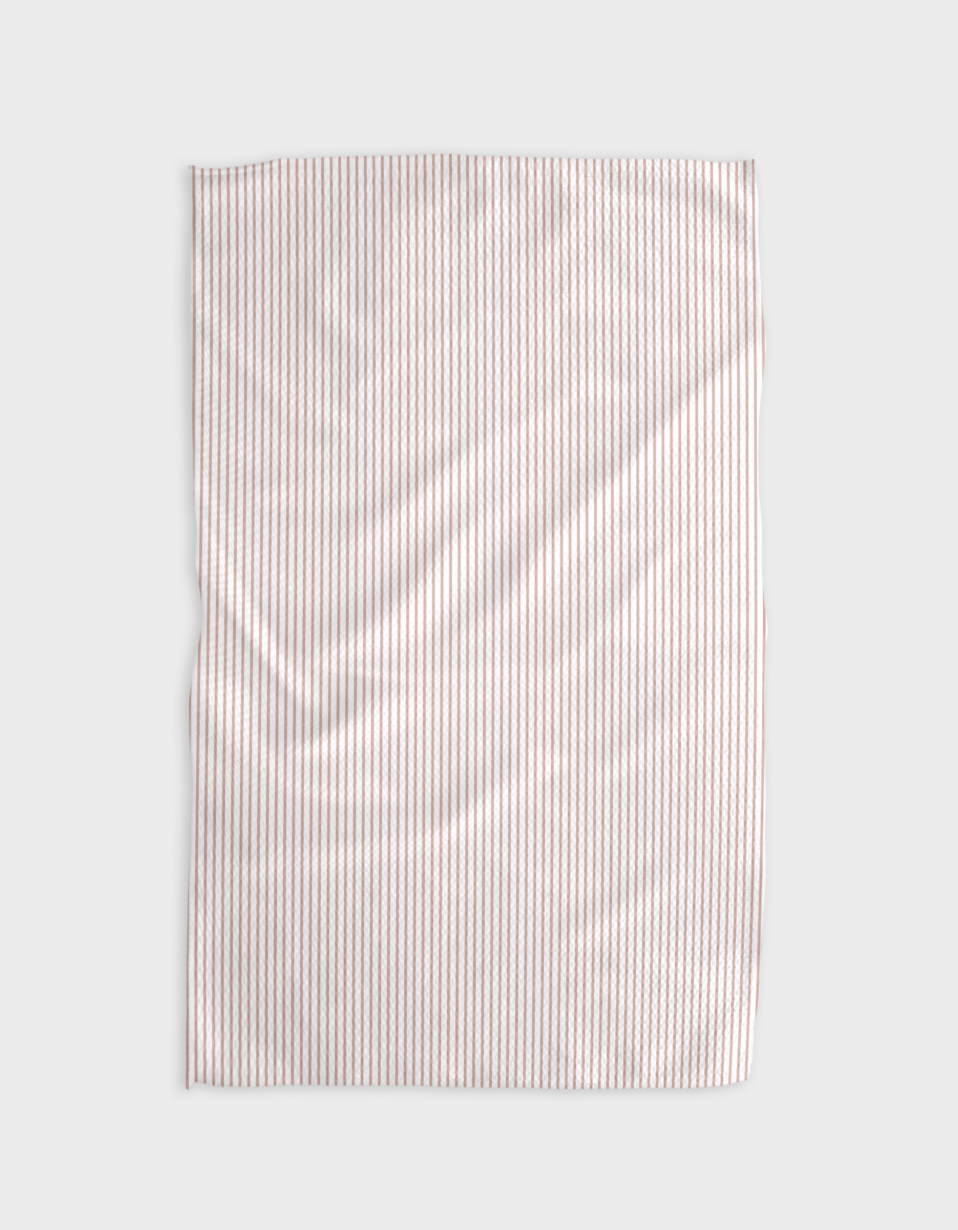 The Buy Guides Get In Line - Dusty Rose Tea Towel, made of Geoweave fabric with thin red and white vertical stripes, is rectangular, slightly wrinkled, and laid flat on a light gray background.