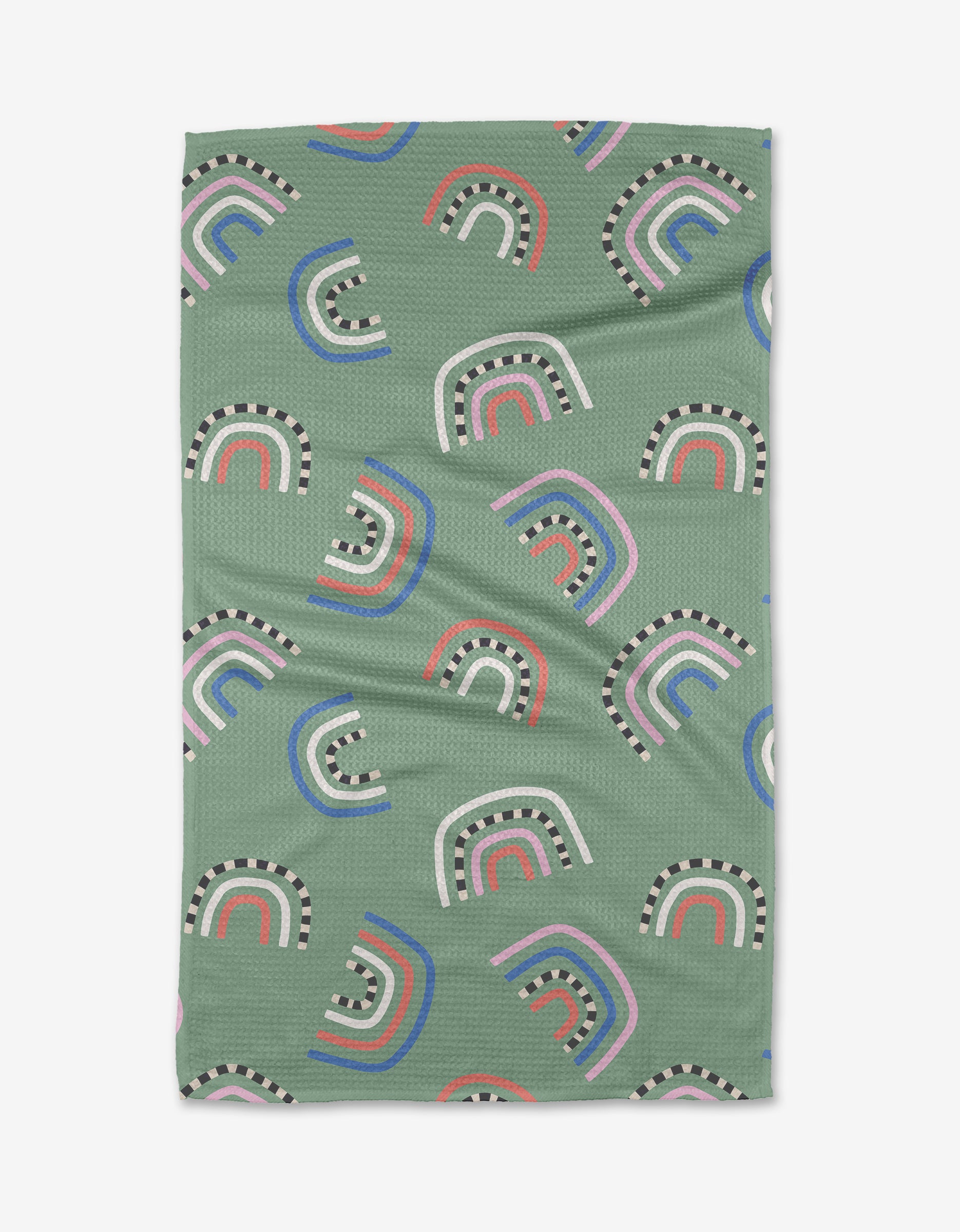 The After the Rain tea towel by Claire Iglesias is a green, rectangular towel with abstract rainbow shapes in blue, red, pink, black, and white, made from ultra-absorbent recycled materials.
