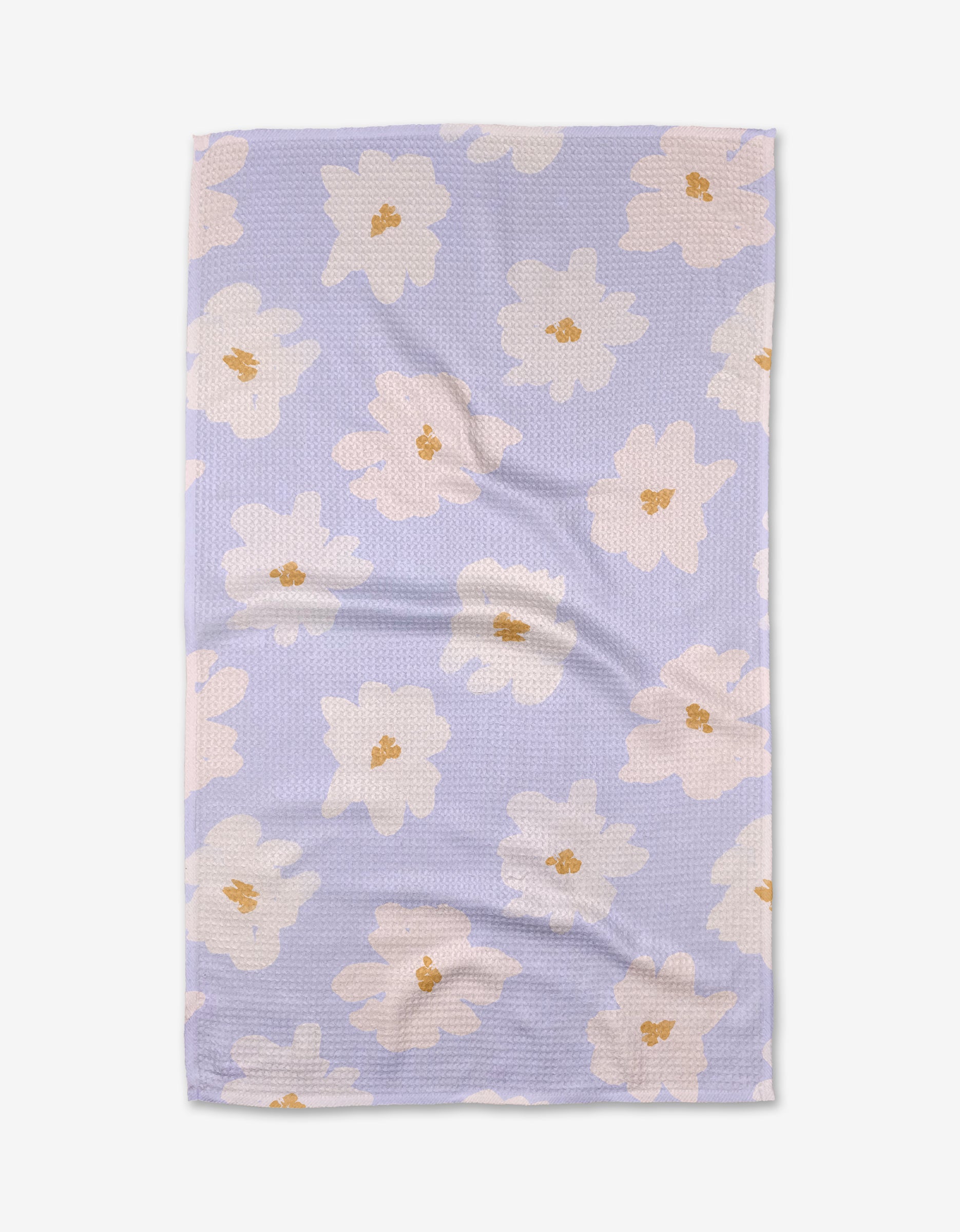The Alpine Blooms tea towel by Mandy Arroyo features a rectangular shape in light purple Geoweave fabric with a textured surface and large white and beige flowers with yellow centers, shown on a white background.
