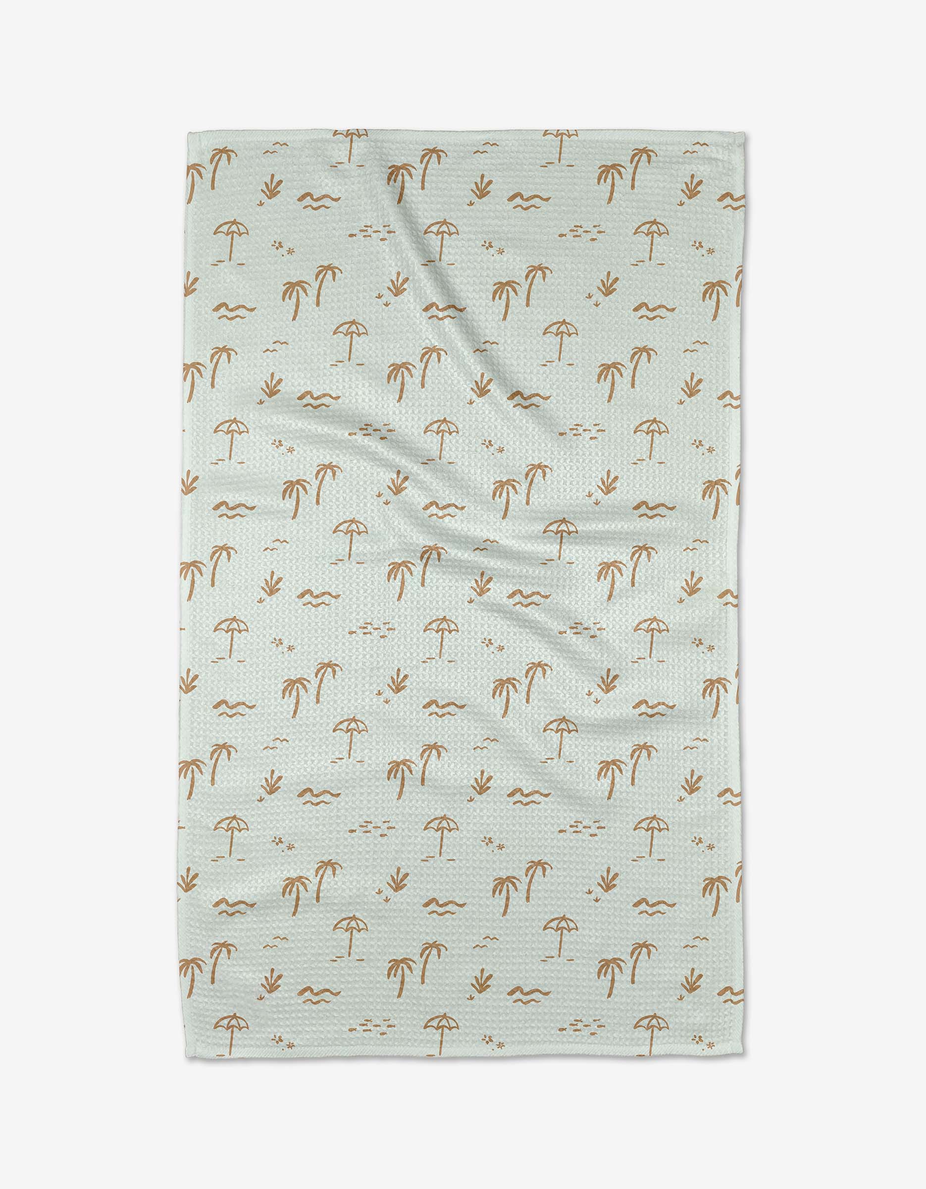 The Beach Tea Towel by Jen B. Peters features a light blue Geoweave™ fabric with a repeating pattern of brown palm trees, beach umbrellas, birds, and waves, shown laid flat on a white background.