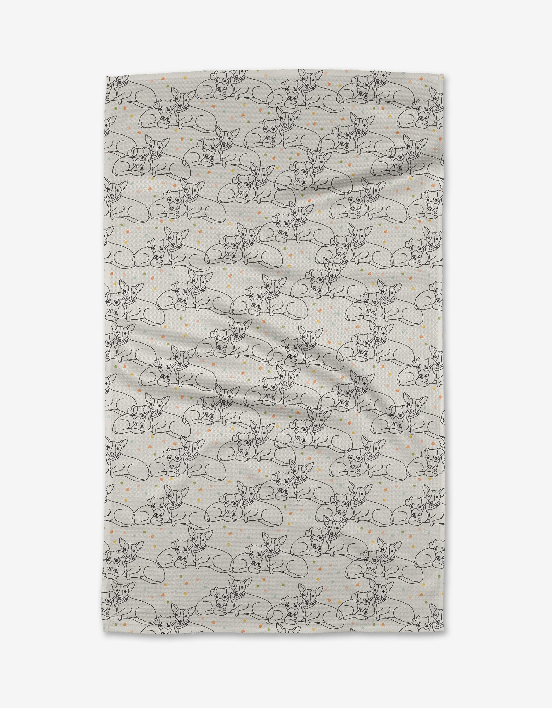 The Berry and Louie kitchen towel by Sweet Simple Vegan features a light background with a repeating pattern of line-drawn mice and small orange dots. It is shown laid flat, displaying gentle folds and subtle wrinkles.