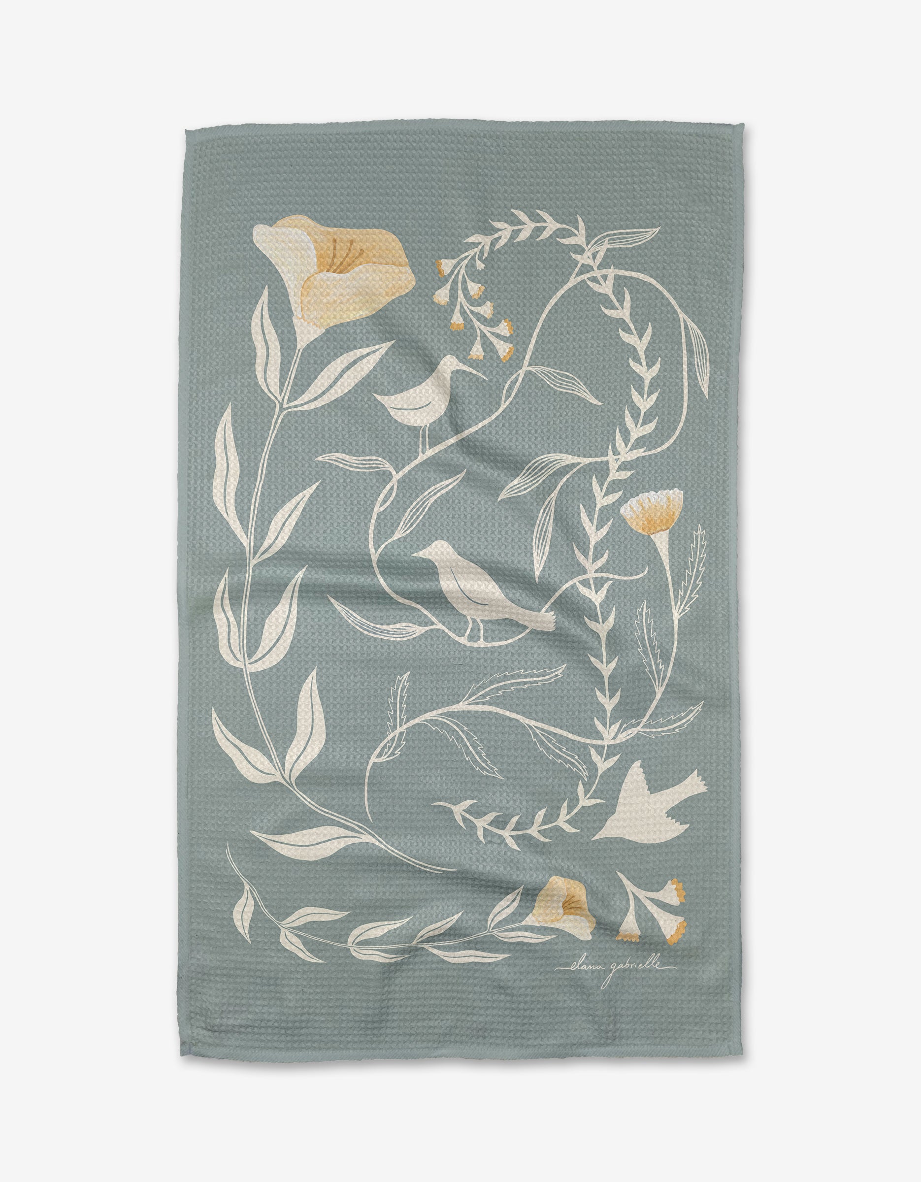 Birdsong by Elana Gabrielle is a light blue textured tea towel with white and yellow floral vine designs, crafted from eco-friendly Geoweave fabric and finished with the artist’s signature in the bottom right corner.