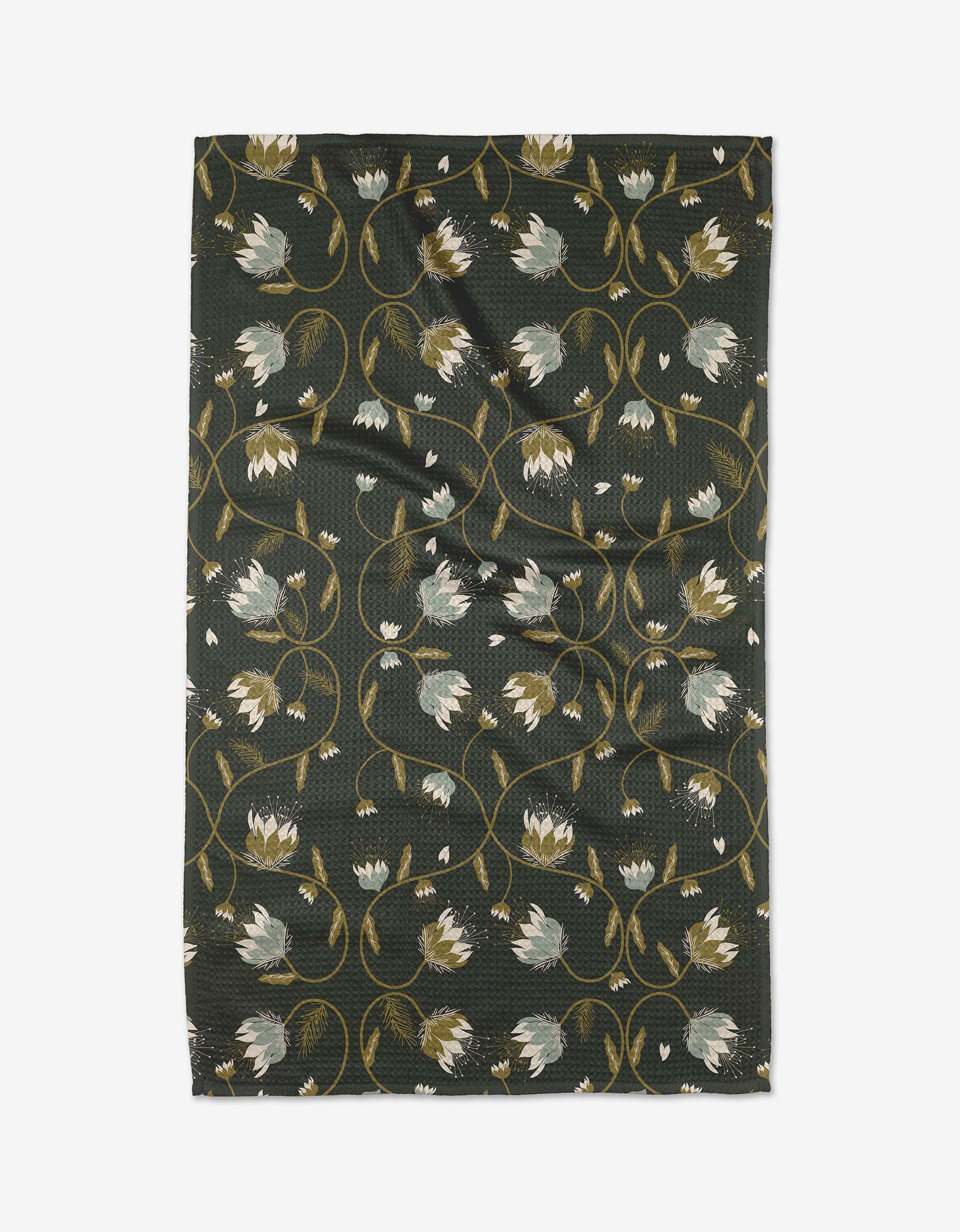 The Blockprint Floral by Ash Cascade features dark green Geoweave fabric with white and pale yellow flowers linked by gold vines, crafted from recycled materials. The slightly wrinkled textile is shown flat on a white background.