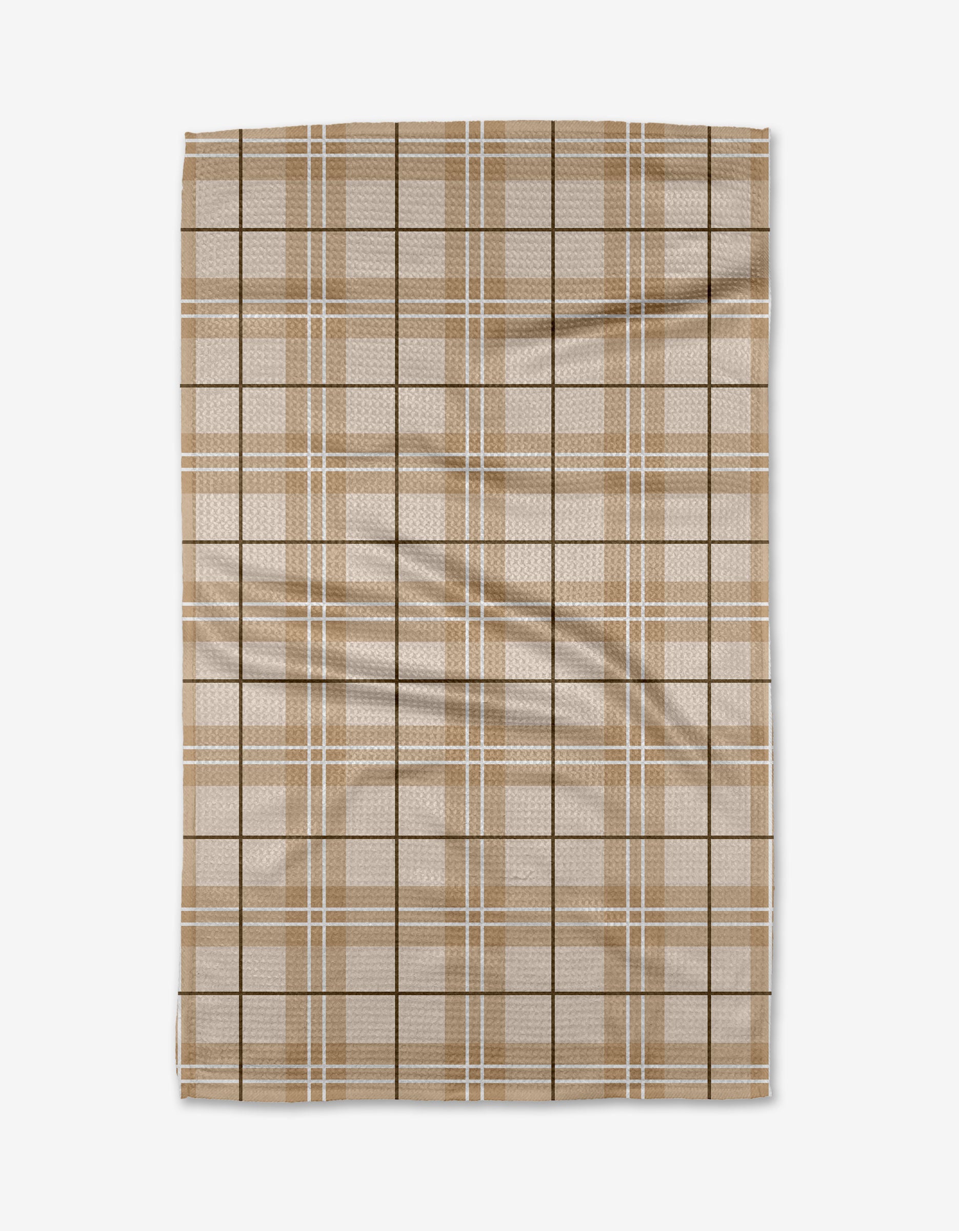 The Purely Kaylie Brown Sugar tea towel features a beige and white plaid design made from recycled Geoweave fabric, showcasing a subtle checkered pattern with soft, natural wrinkles on a white background.
