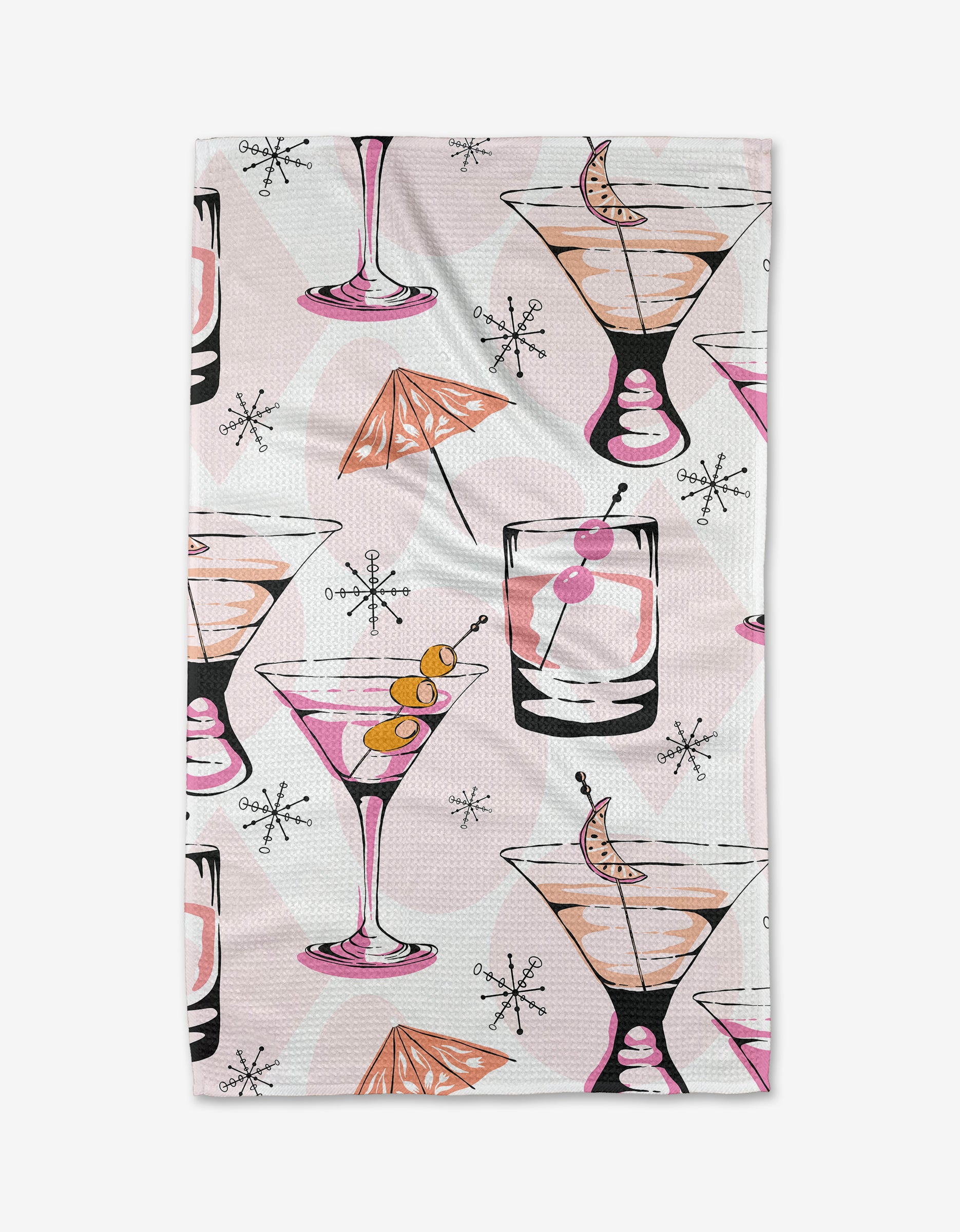 Cocktail Hour is a Geoweave™ tea towel with a retro cocktail pattern—martini and whiskey glasses, pink and orange drinks, olives, cherries, umbrellas, and atomic starbursts on light pink.