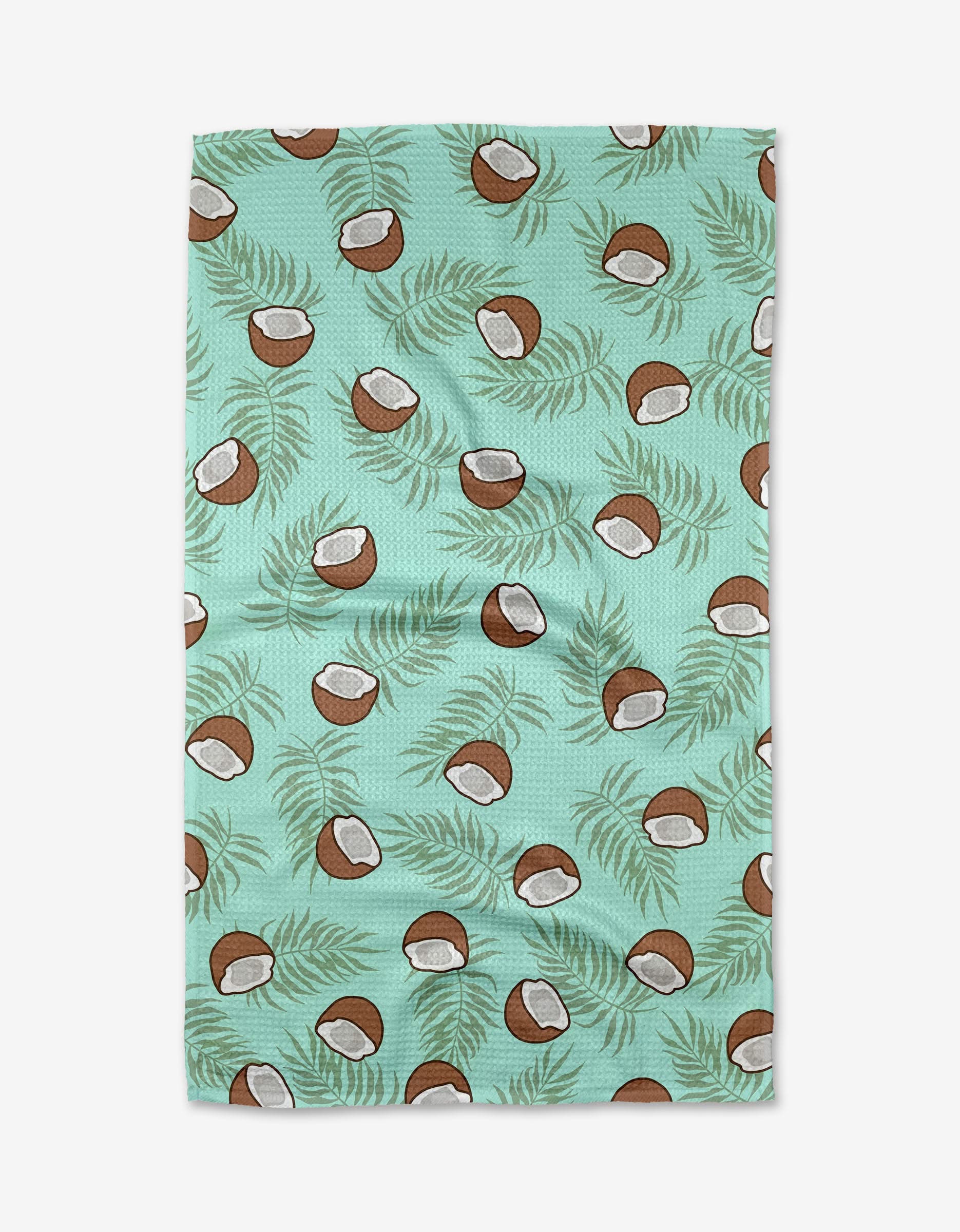 Purely Kaylie’s Coconut Waves Tea Towel features brown coconut halves and green palm leaves on soft recycled Geoweave fabric in teal.