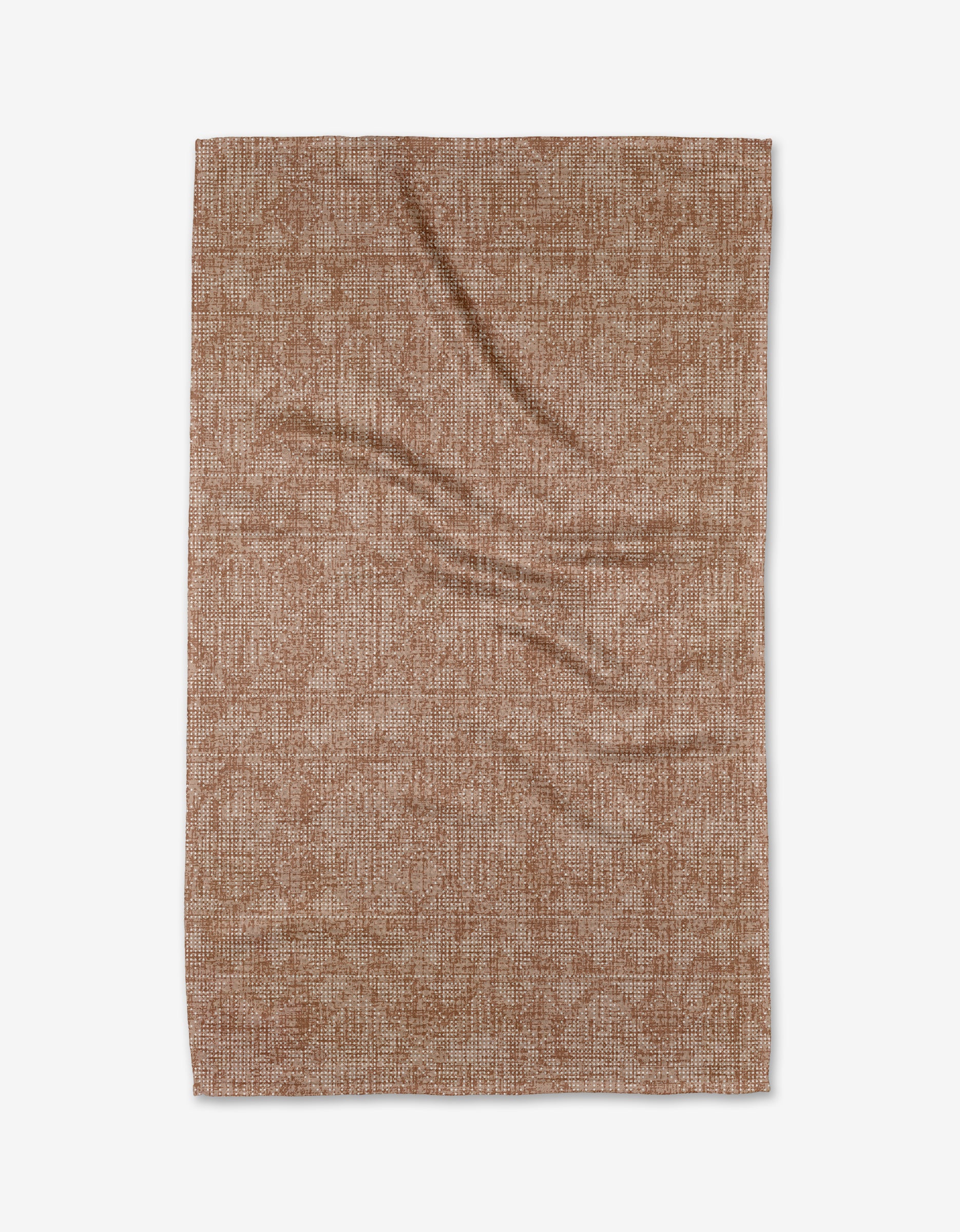 A flat, rectangular Debra Rust tea towel by Becki Owens in brown, featuring a subtle textured pattern and crafted from ultra-absorbent Geoweave fabric. Shown against a white background with a few gentle creases on the material.