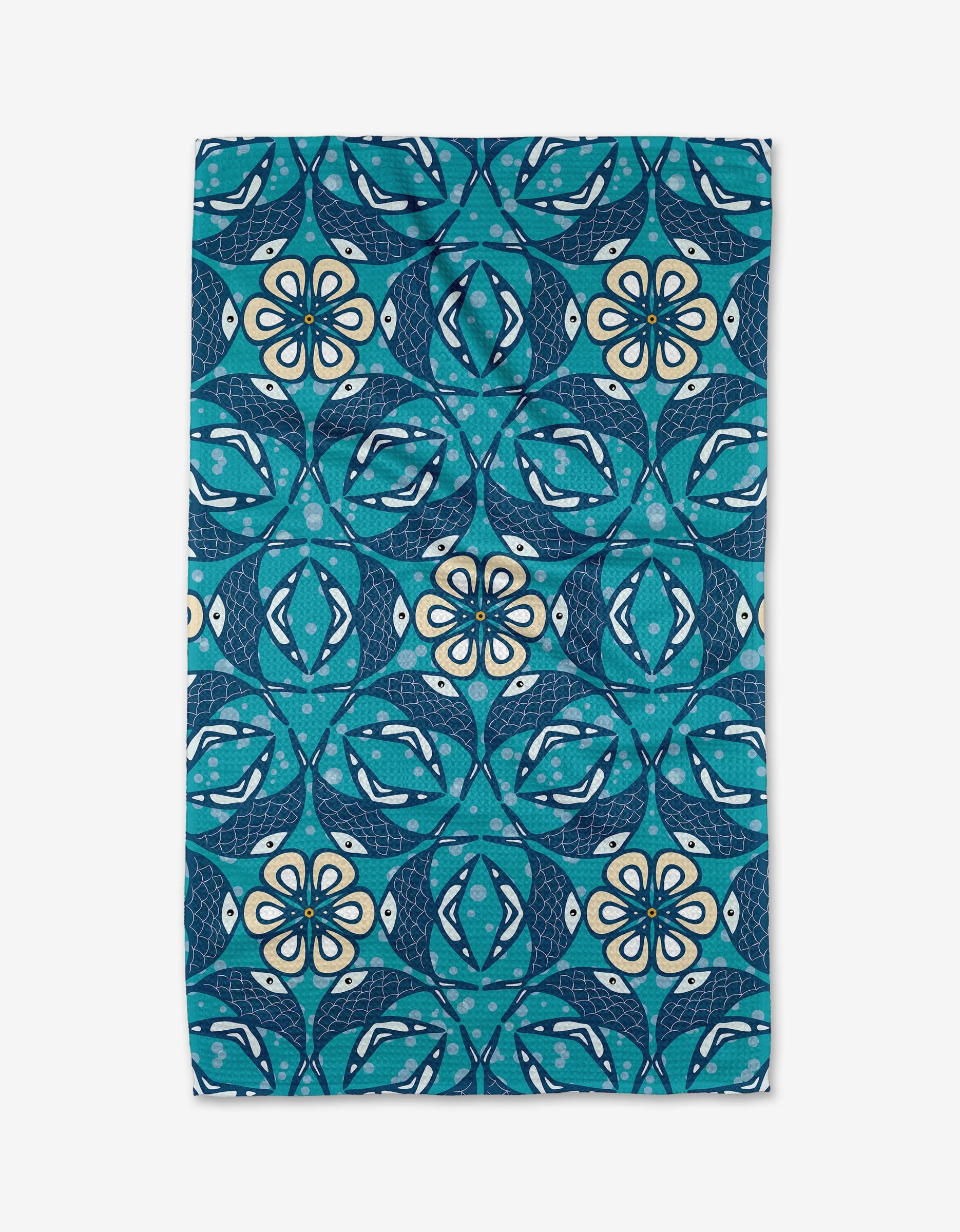 The Fish Mandala kitchen tea towel by Marta Harvey features a rectangular blue and teal design with repeating geometric and floral patterns in white, navy, and turquoise. Made from recycled materials for an eco-friendly touch.