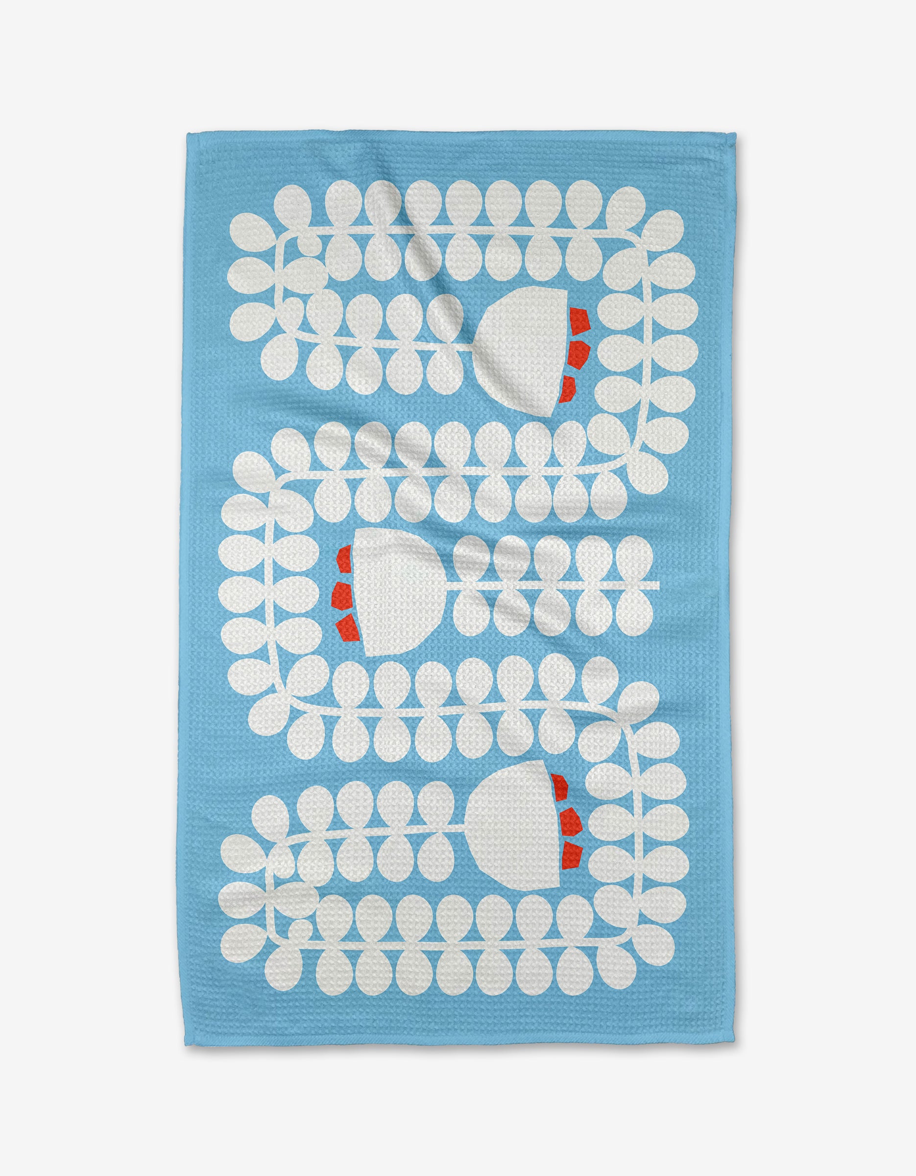 The Happy Hemera Gemini tea towel features a blue geoweave fabric adorned with rows of stylized white flowers with round petals and red accents.