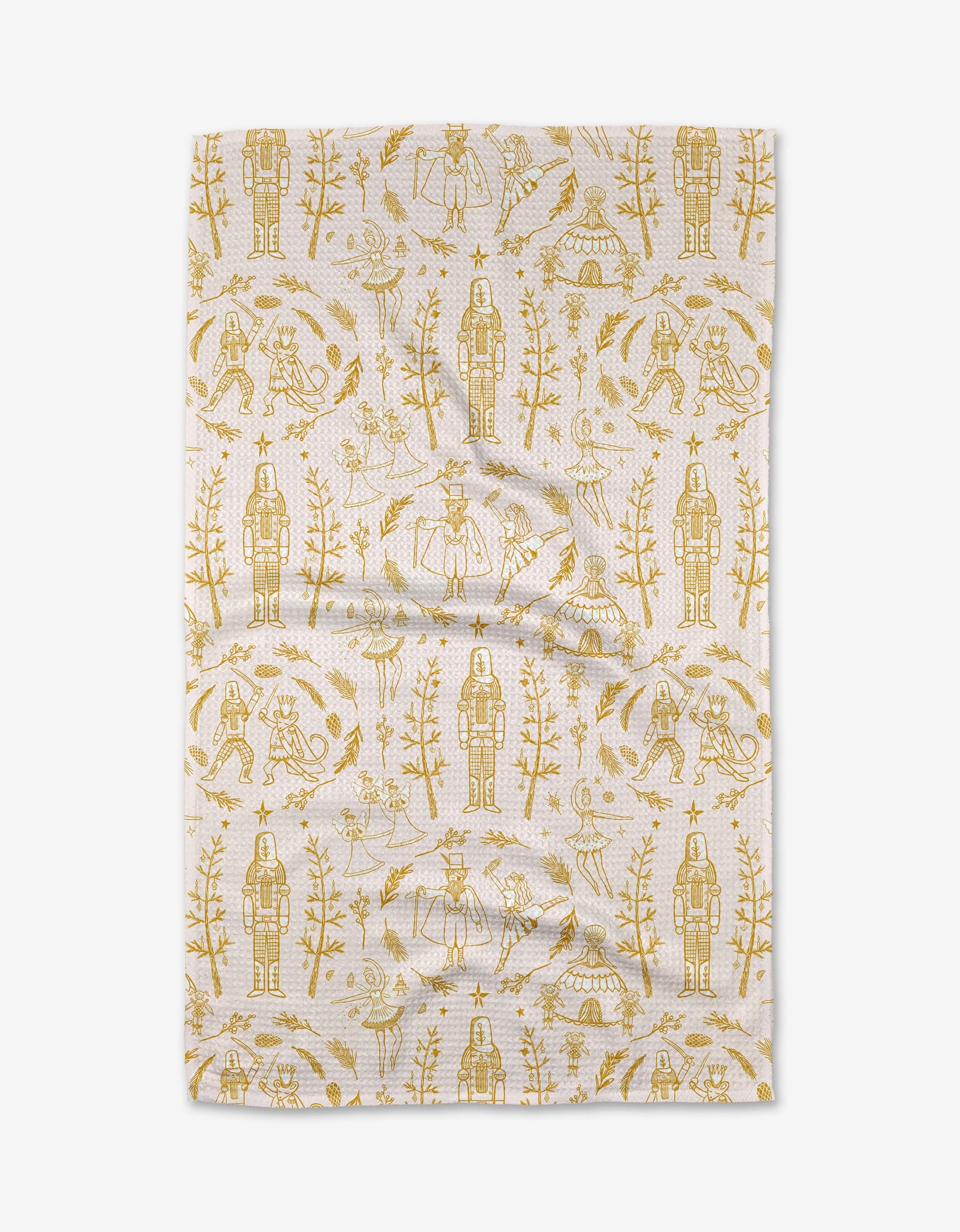 The Elisabeth Wing Golden Nutcracker tea towel features a festive yellow nutcracker, bird, and tree pattern on white, made from quick-drying recycled materials and shown flat with gentle wrinkles.