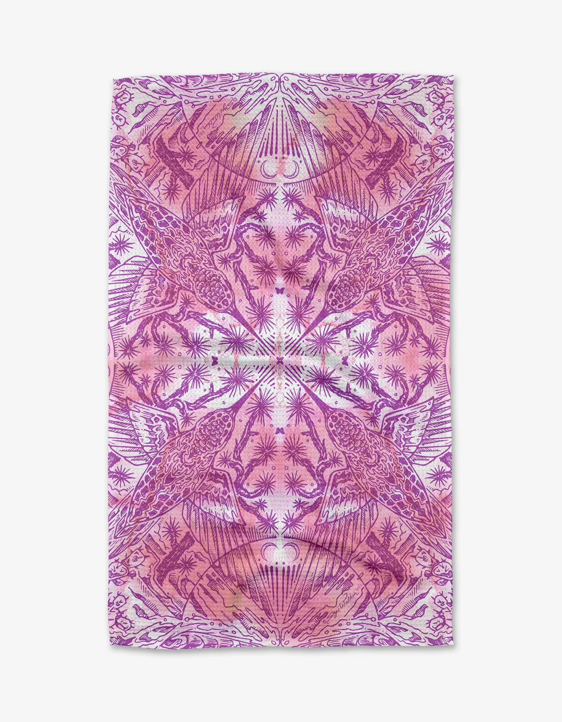 The Hummingbird tea towel by Skye Walker is made from quick-drying recycled materials and showcases a magenta and pink symmetrical pattern with stylized birds, plants, and abstract shapes in a mirrored, kaleidoscopic design.