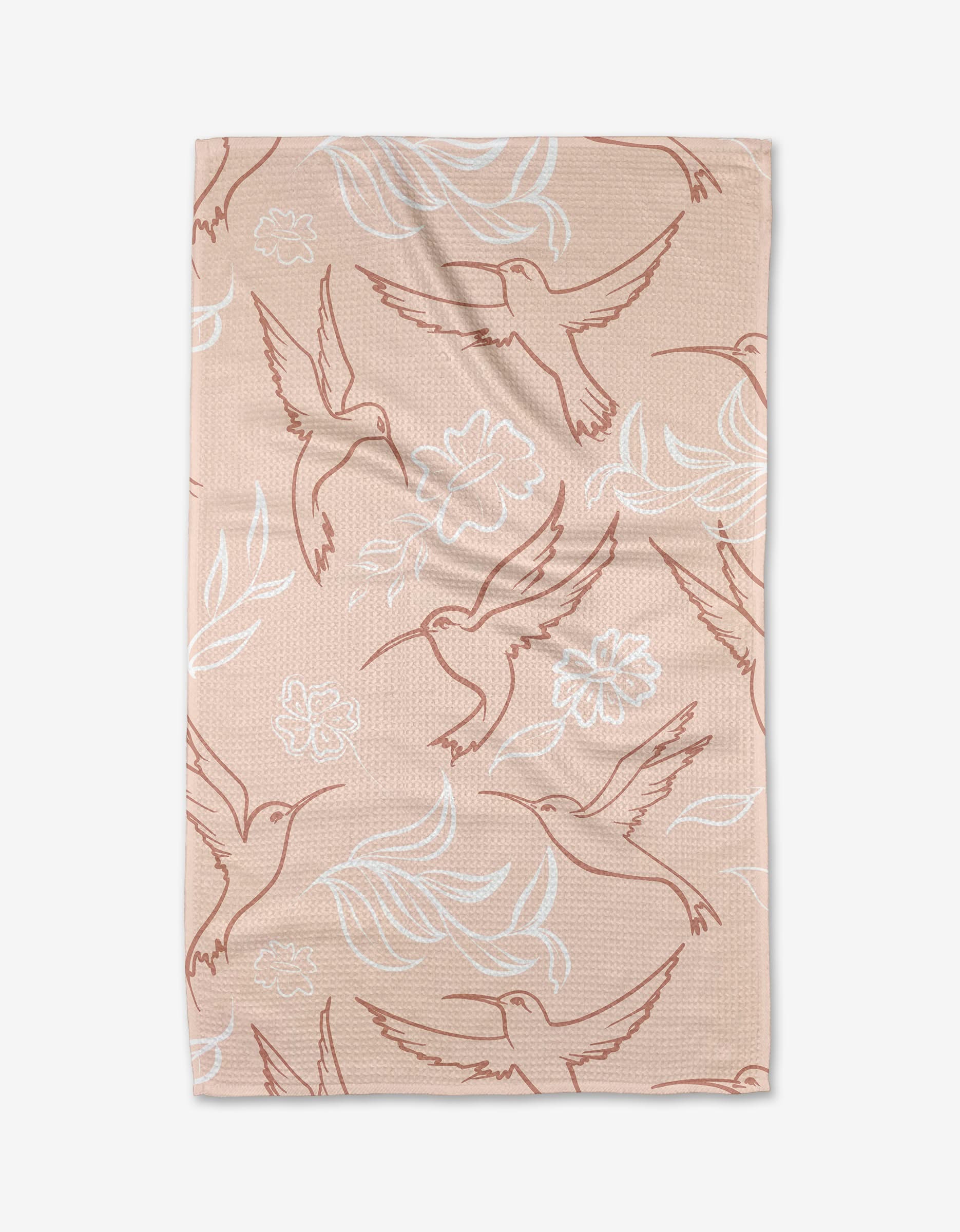 The Elena Fay Hummingbirds tea towel is light brown, made from recycled materials, and features outlined hummingbirds and floral patterns in white and reddish-brown for a charming, eco-friendly touch.