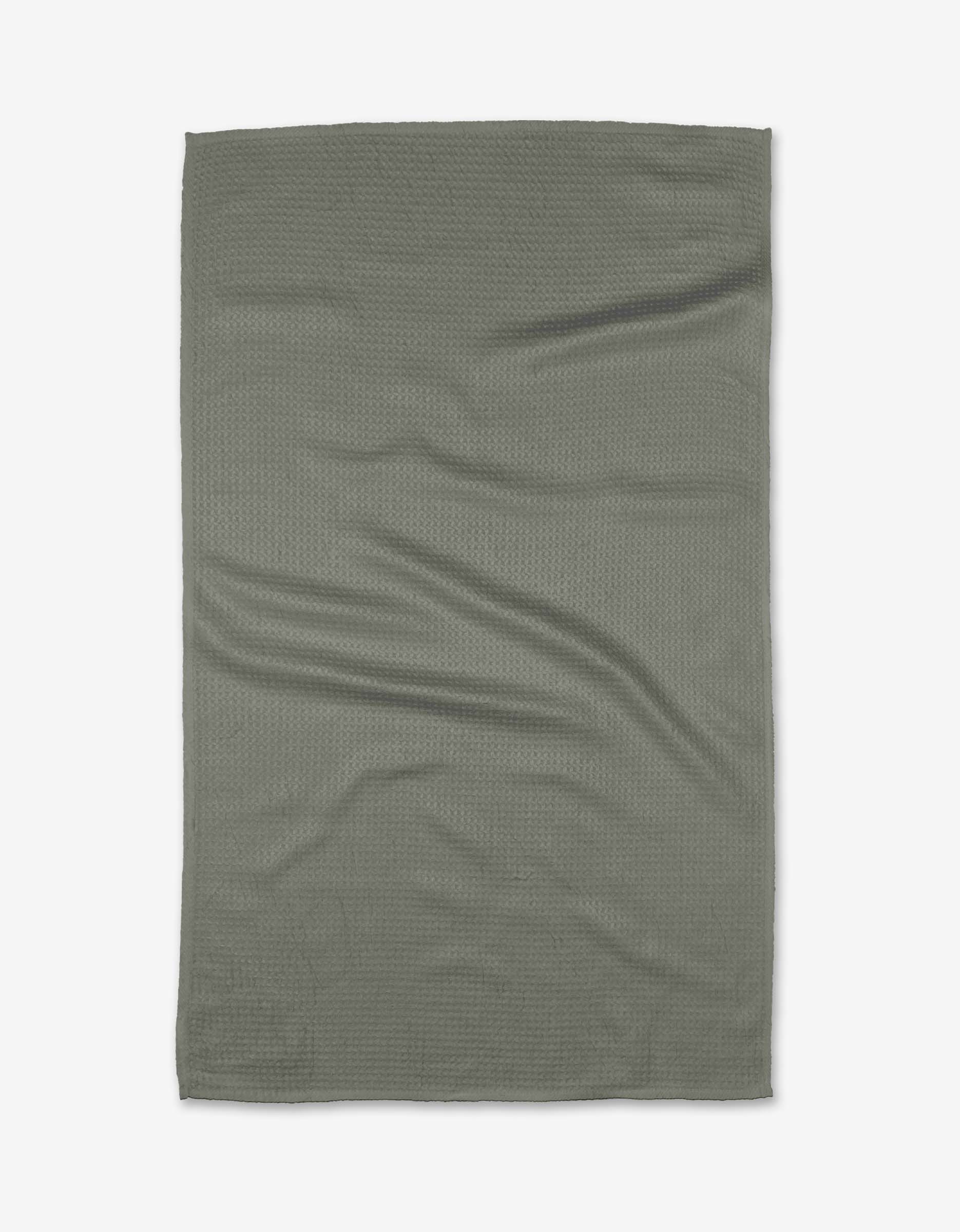 The Kailee Wright Hunter Green towel, flat and rectangular with ultra-absorbent fabric, is laid out on a white background, showing slight creases and folds.