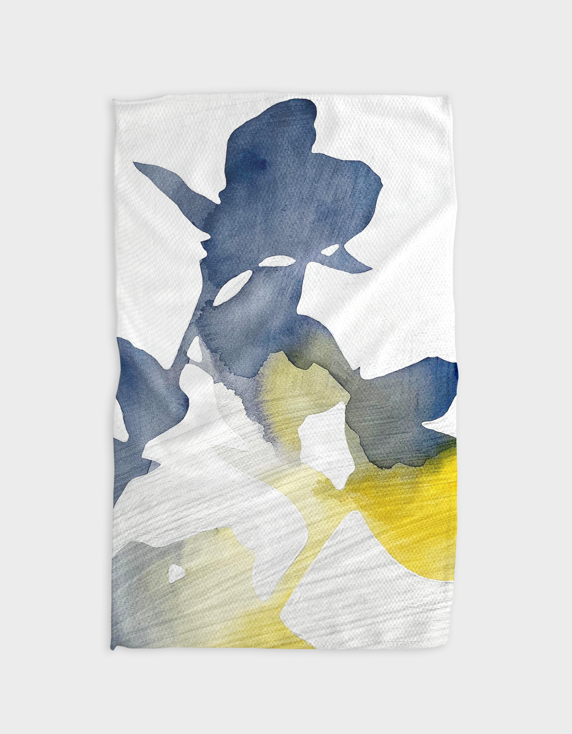 The Rachel Austin Botanical Watercolor Dawn blanket features large abstract shapes in blue, gray, and yellow on white, crafted from soft recycled Geoweave™ fabric.