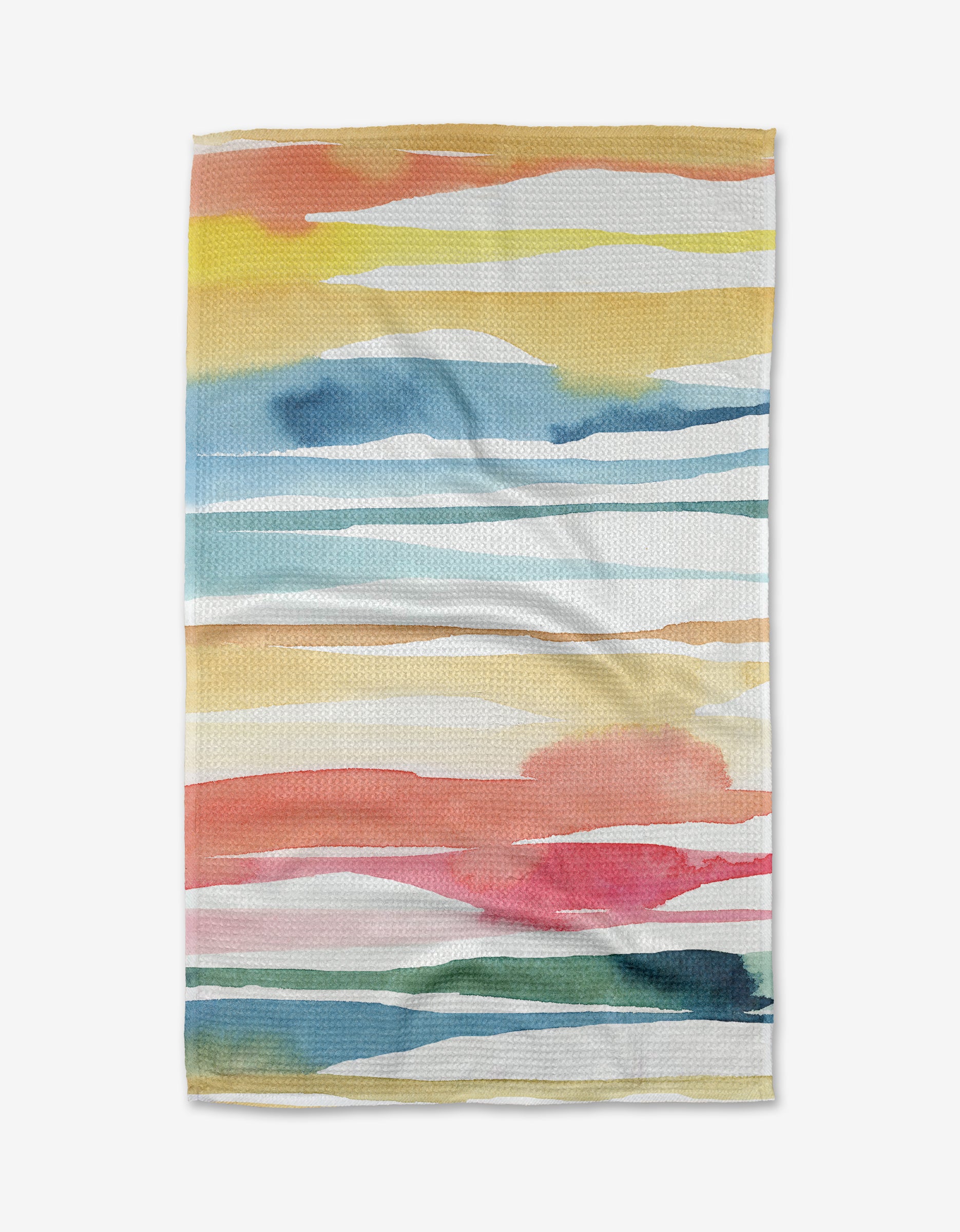The Lakeside Tea Towel by Sara Mari features horizontal watercolor stripes in yellow, orange, blue, pink, green, and white on soft Geoweave fabric. Made with recycled materials for eco-friendly flair and an abstract landscape look.