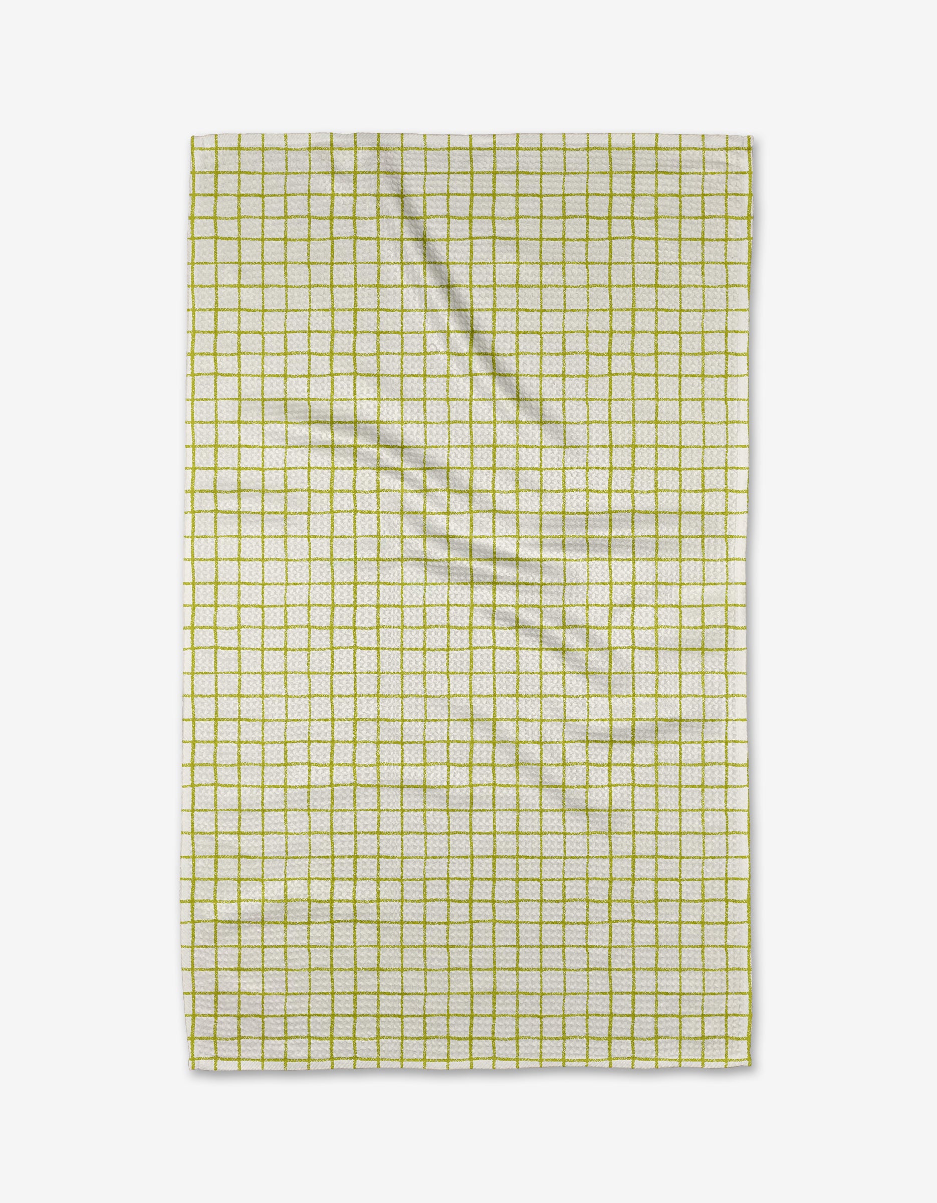 The On the Lawn tea towel by Kayla Ann is a rectangular, white kitchen towel featuring a grid of thin yellow lines. Absorbent and lightly creased, it’s shown flat against a white background.