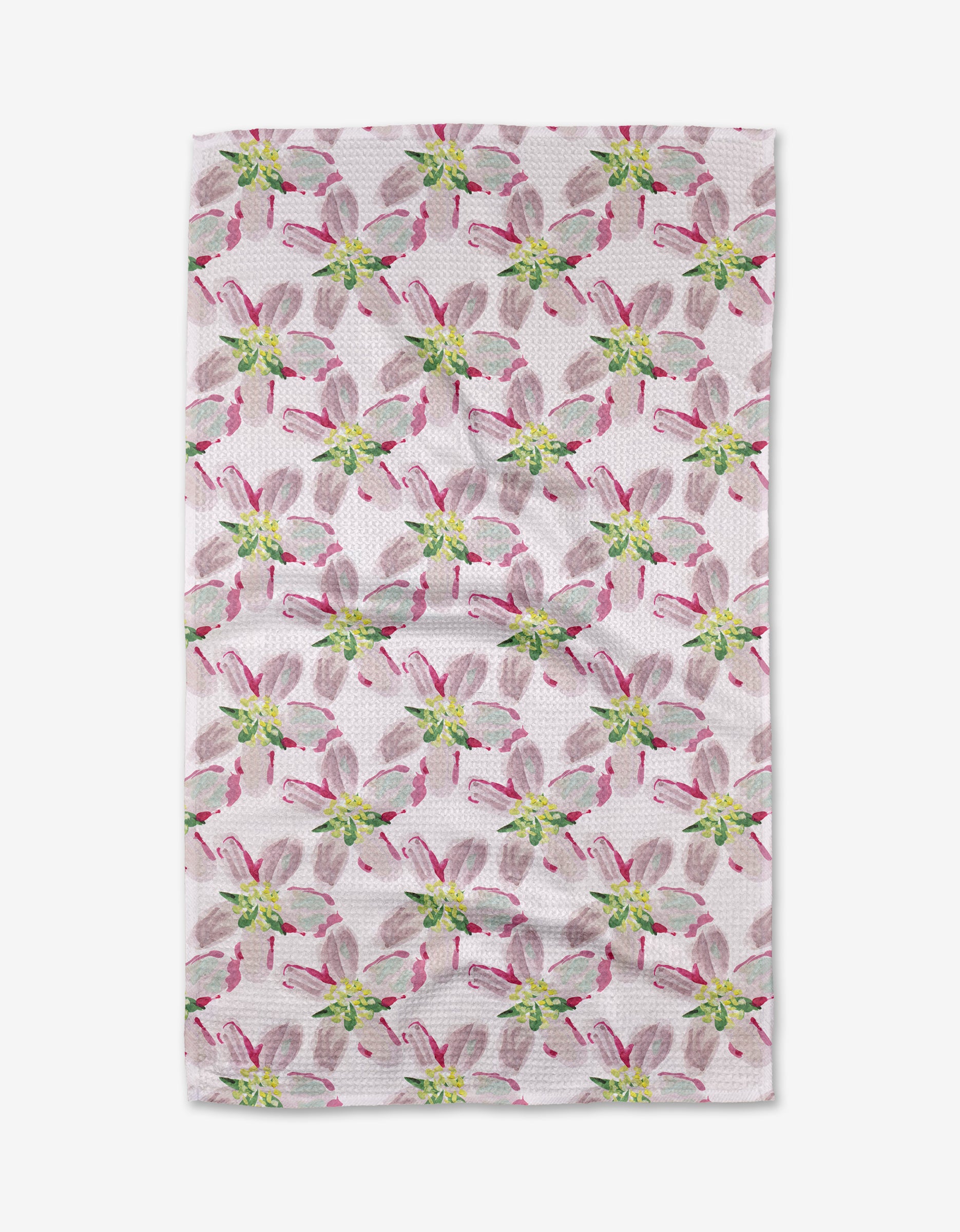 The Orchard in Bloom tea towel from Ania Zwara Art features a white textured surface with evenly spaced stylized floral designs in pink, green, and gray. Made from ultra-absorbent recycled materials for eco-friendly use.