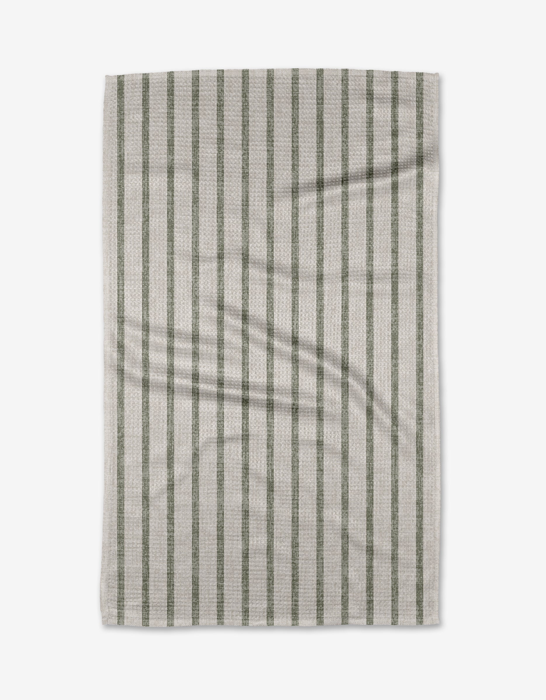 The Becki Owens Ren Sage tea towel, made from Geoweave™ fabric and recycled materials, features evenly spaced vertical green stripes on beige and is shown flat on a white background with light creasing.