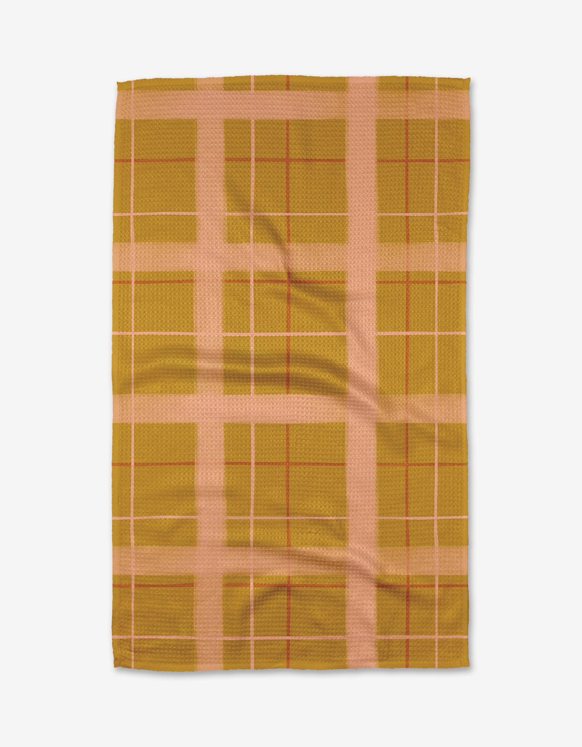 The Elisabeth Wing Scotland Yard tea towel features a mustard yellow and light pink plaid with wide and narrow intersecting lines. Made from soft Geoweave fabric for enhanced absorbency, its shown laid flat on a white background.