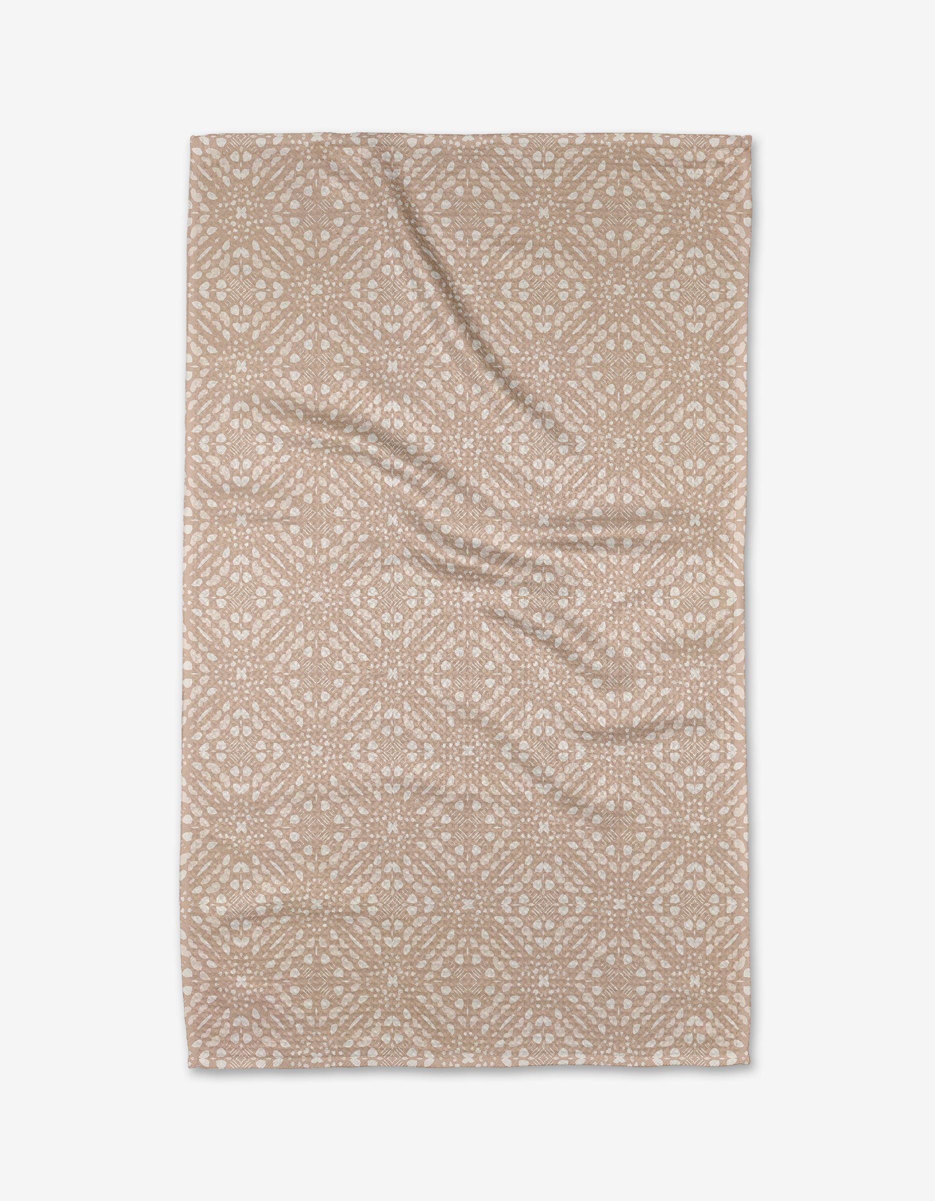 Seeds and Nuts Neutral by Twig + Spark: a beige rectangular tea towel featuring a white geometric and floral print. Made from soft recycled materials, the fabric is slightly wrinkled and shown flat on a white background.
