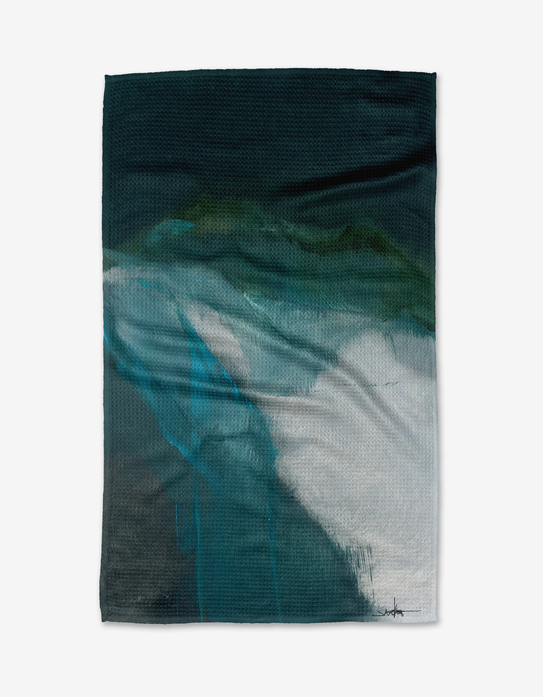 The Air We Breathe tea towel by Jennifer Janesko features a textured Geoweave™ fabric and an abstract mountain-inspired design in dark green, teal, and white tones.