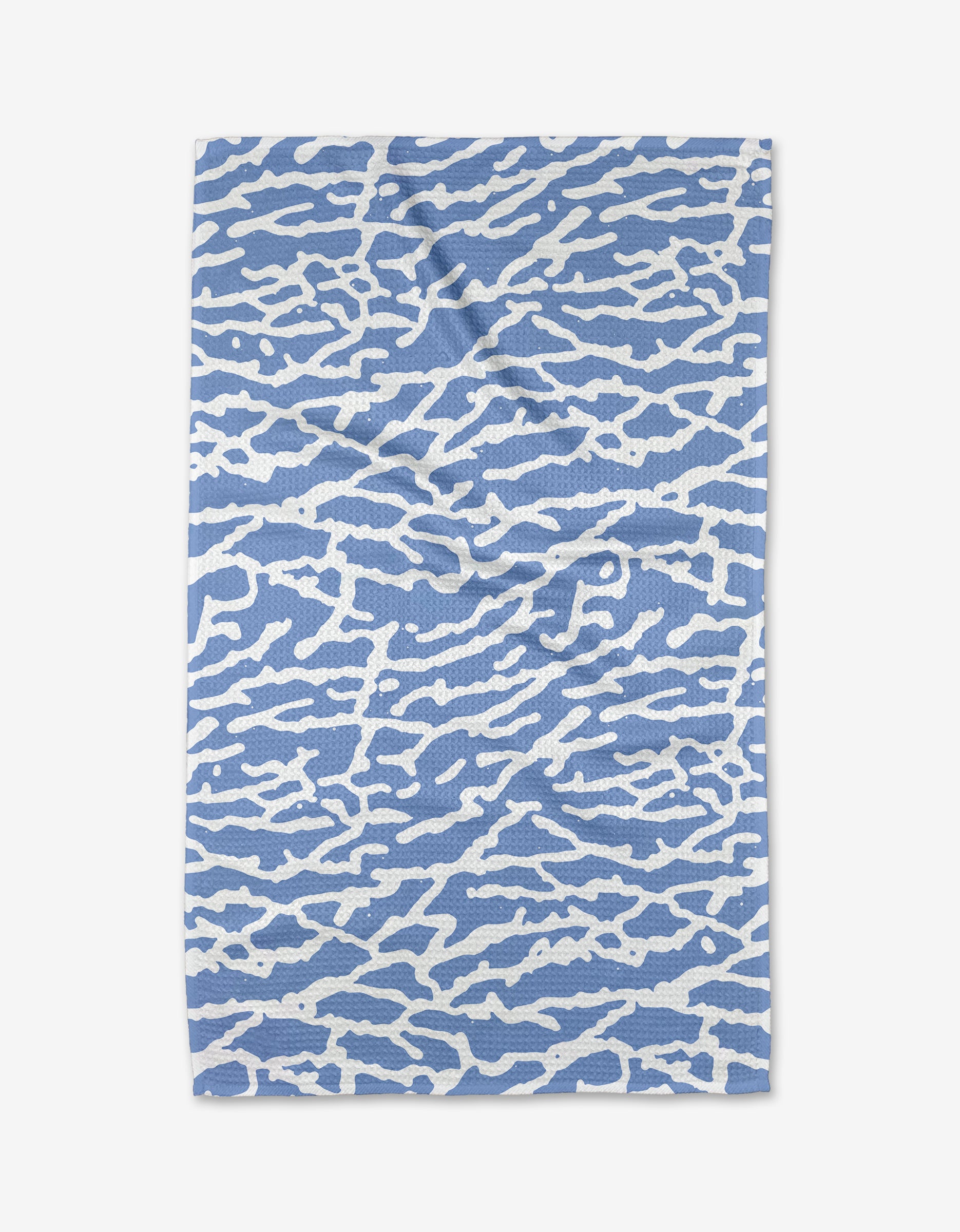 The Sissy Moon Tinker Tea Towel features an abstract pattern of irregular white lines on a light blue background, evoking light on water, and is crafted from eco-friendly materials for sustainable style.
