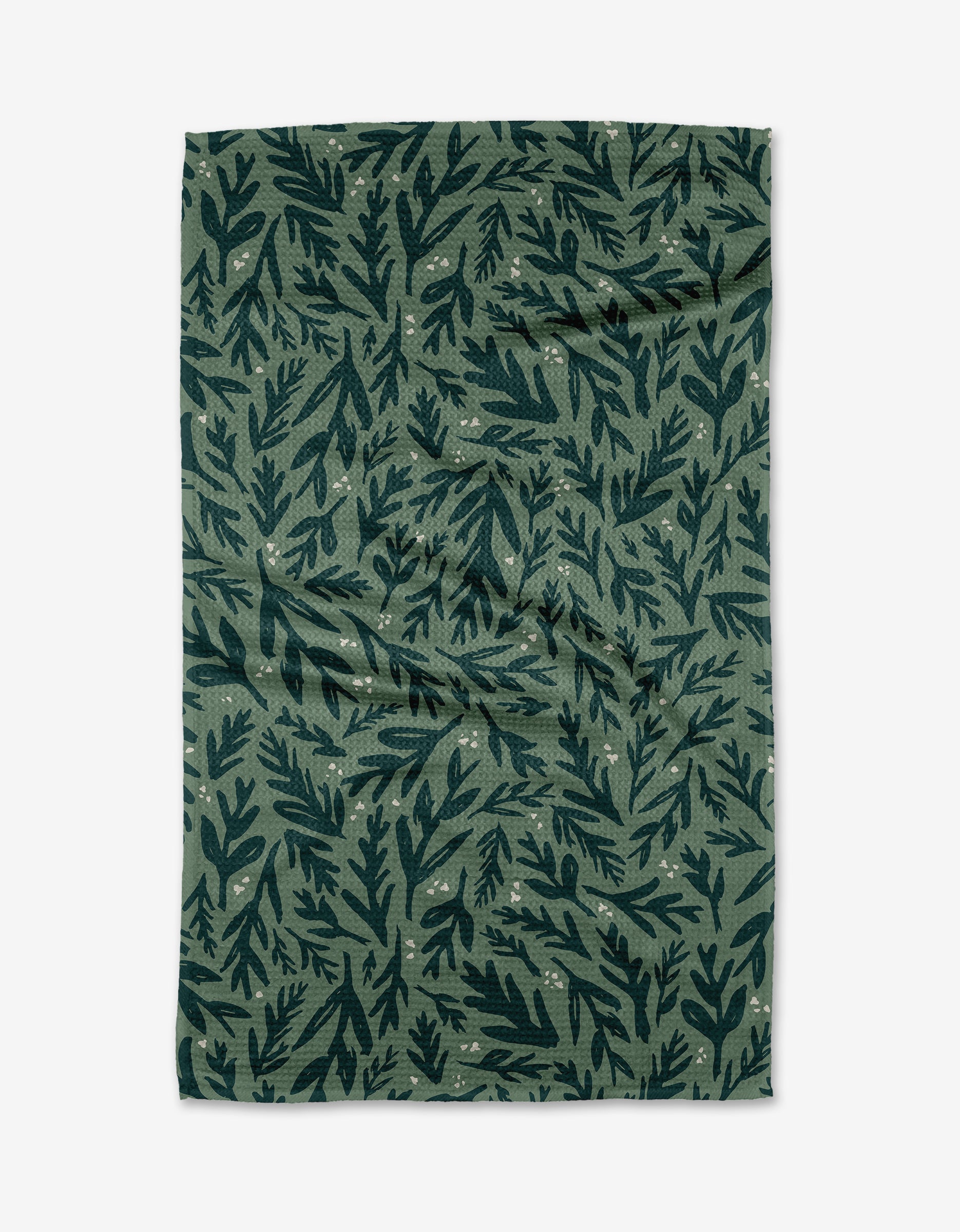 The Twig + Spark Trail Dusting green tea towel, crafted from eco-friendly Geoweave™ fabric, features a dark green leafy pattern with small pale dots and is displayed flat on a white background.