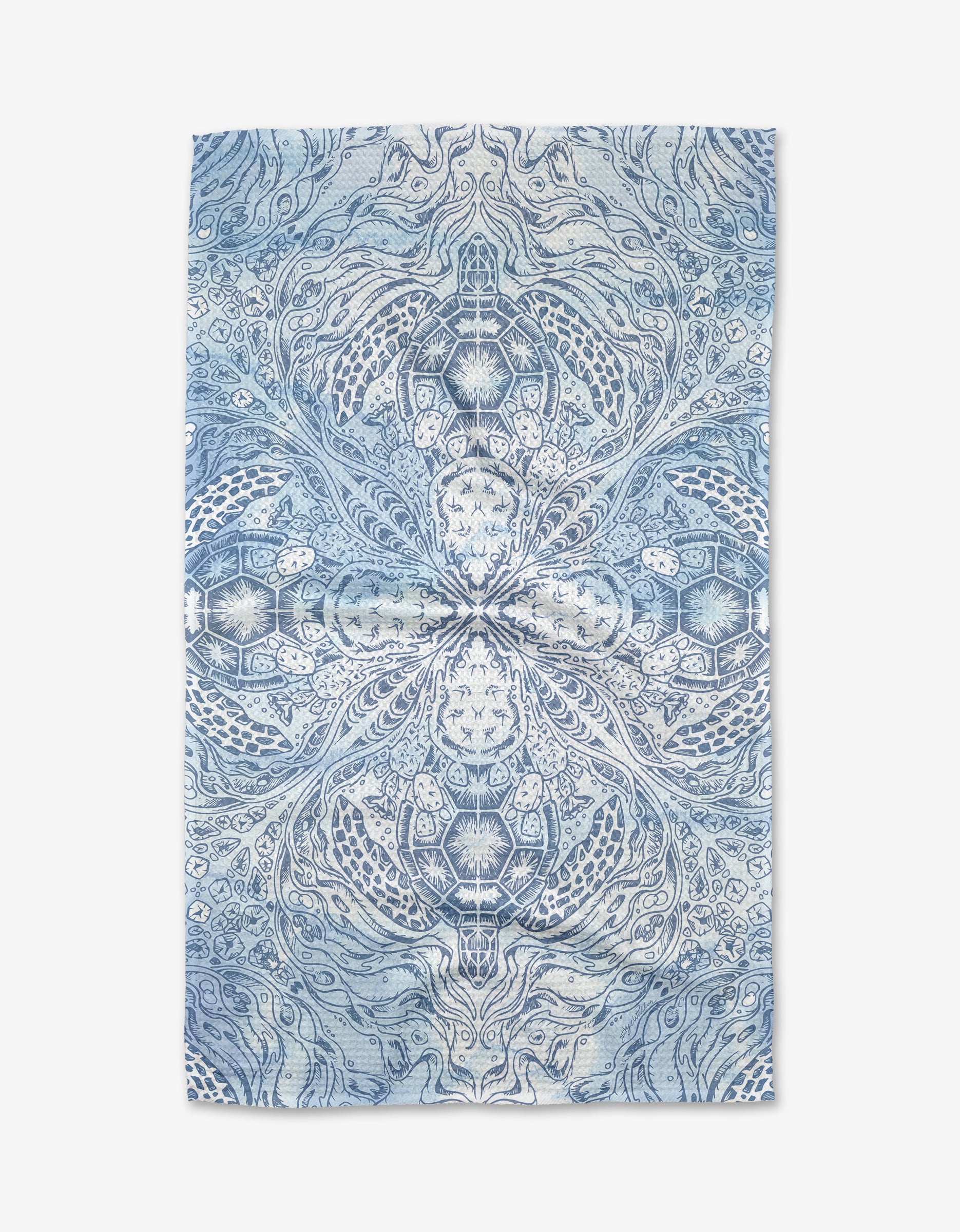 A blue and white Skye Walker Turtle Tea Towel with a symmetrical, intricate pattern of swirling lines and nature-inspired designs. Crafted from soft Geoweave™ fabric for lasting quality.