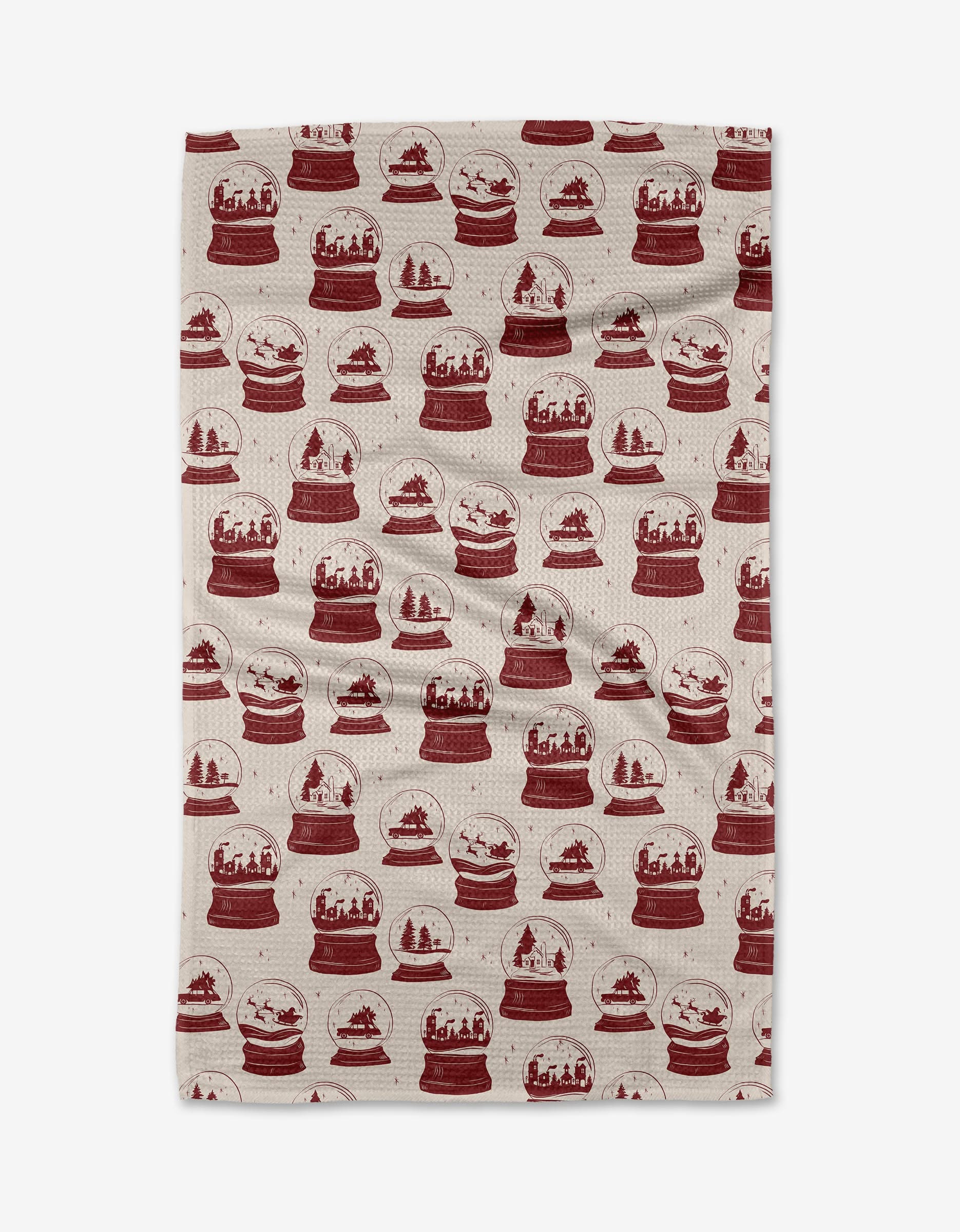 The Vintage Snow Globes Red tea towel by Aubrey Fairchild features rows of red snow globes with winter scenes on beige, made from recycled materials for an eco-friendly kitchen accent.