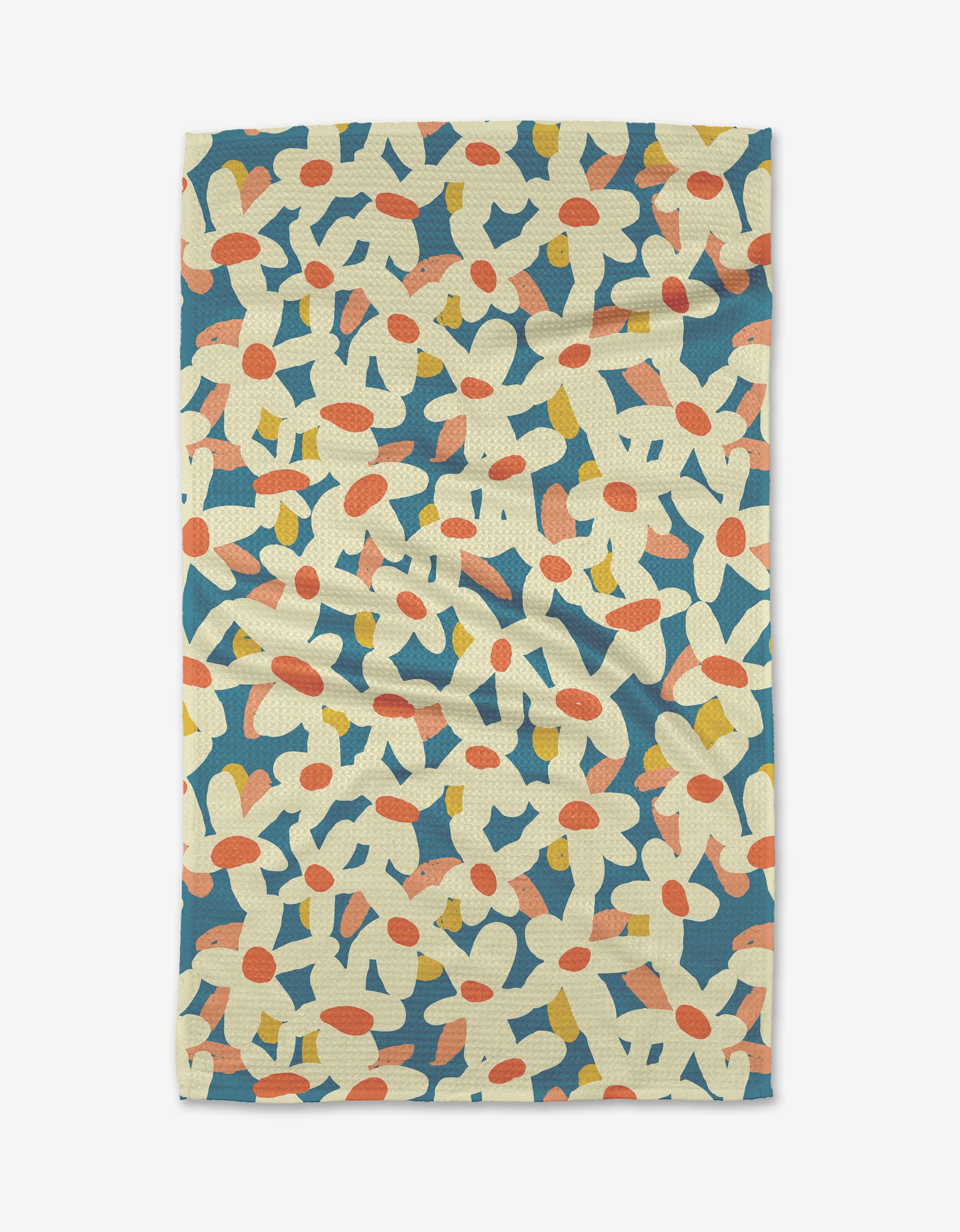 The Kelsey Weigl Whoopsie Daisy is a rectangular Geoweave fabric with large cream, yellow, and orange abstract flowers on blue. Ultra-absorbent and stylish, it lies flat on a white surface with a slightly wrinkled look.