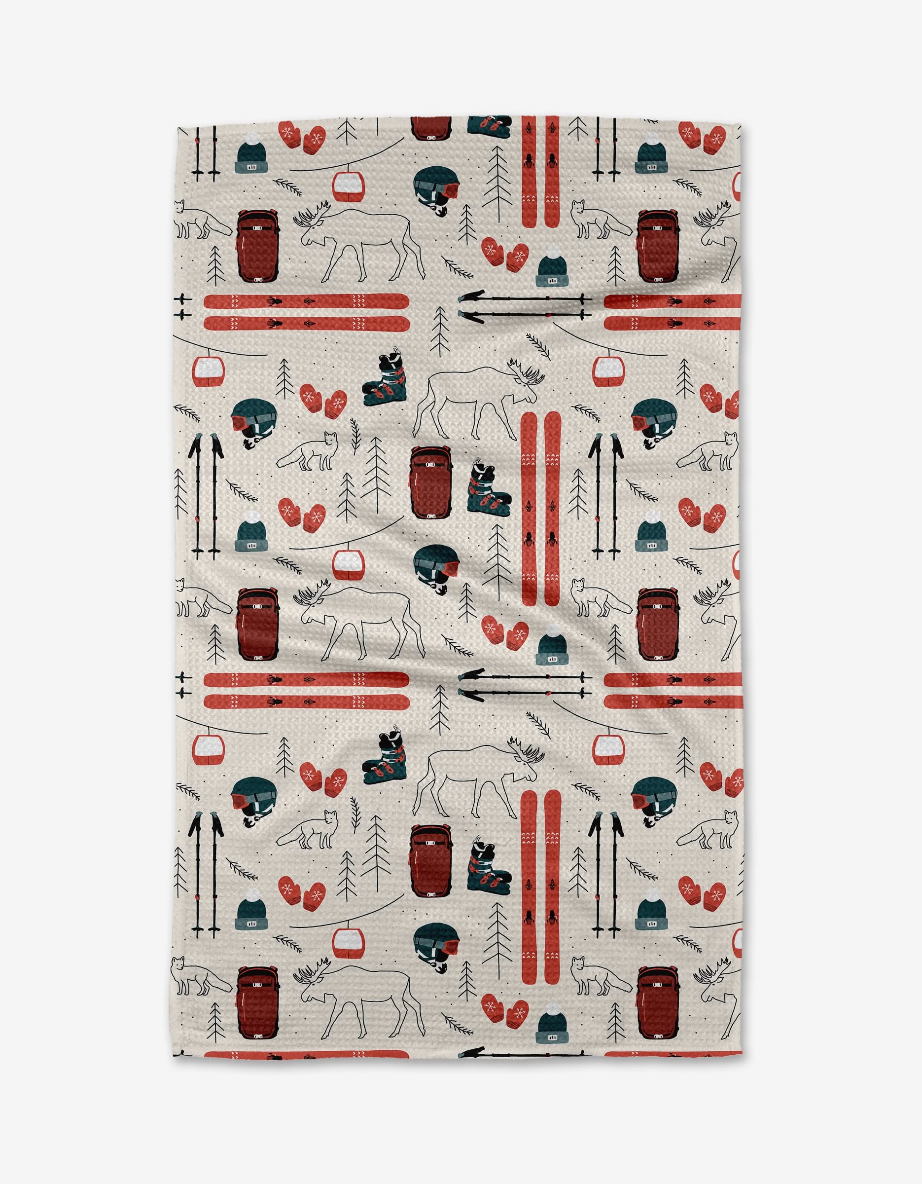 The Winter Skiing tea towel by Coit Creative features a beige, ultra-absorbent design with red skis, camping gear, hiking boots, and woodland animals—bringing outdoor adventure charm to your kitchen.