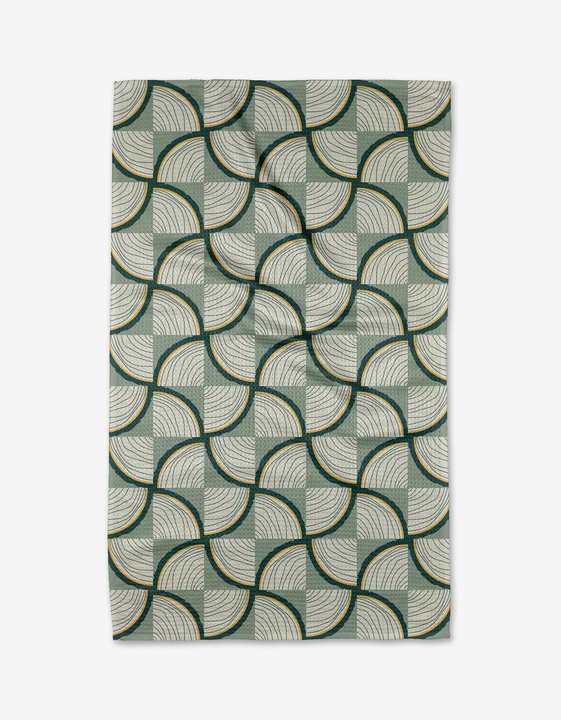 The Twig + Spark Woodpile rug features fan-shaped geometric arcs in green, cream, and dark yellow on a light background—perfect for pairing with an eco-friendly tea towel in your kitchen décor.